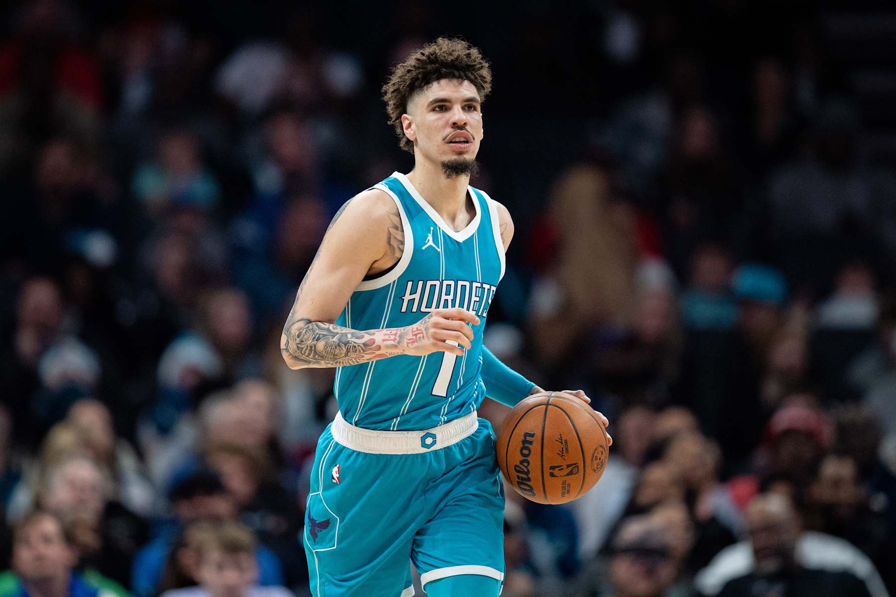 CHARLOTTE, NORTH CAROLINA - DECEMBER 23: LaMelo Ball #1 of the Charlotte Hornets plays against the Houston Rockets during their game at Spectrum Center on December 23, 2024 in Charlotte, North Carolina. NOTE TO USER: User expressly acknowledges and agrees that, by downloading and or using this photograph, User is consenting to the terms and conditions of the Getty Images License Agreement. (Photo by Jacob Kupferman/Getty Images)