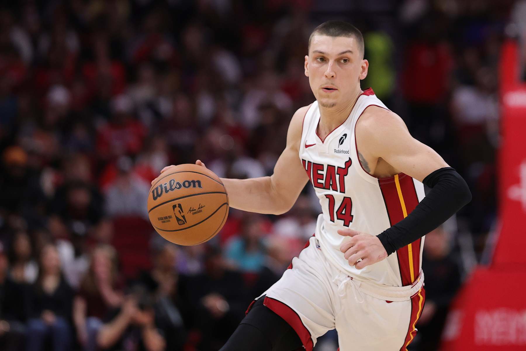 HOUSTON, TEXAS - DECEMBER 29: Tyler Herro #14 of the Miami Heat drives against the Houston Rockets during the first half at Toyota Center on December 29, 2024 in Houston, Texas.  NOTE TO USER: User expressly acknowledges and agrees that, by downloading and or using this photograph, User is consenting to the terms and conditions of the Getty Images License Agreement. (Photo by Alex Slitz/Getty Images)