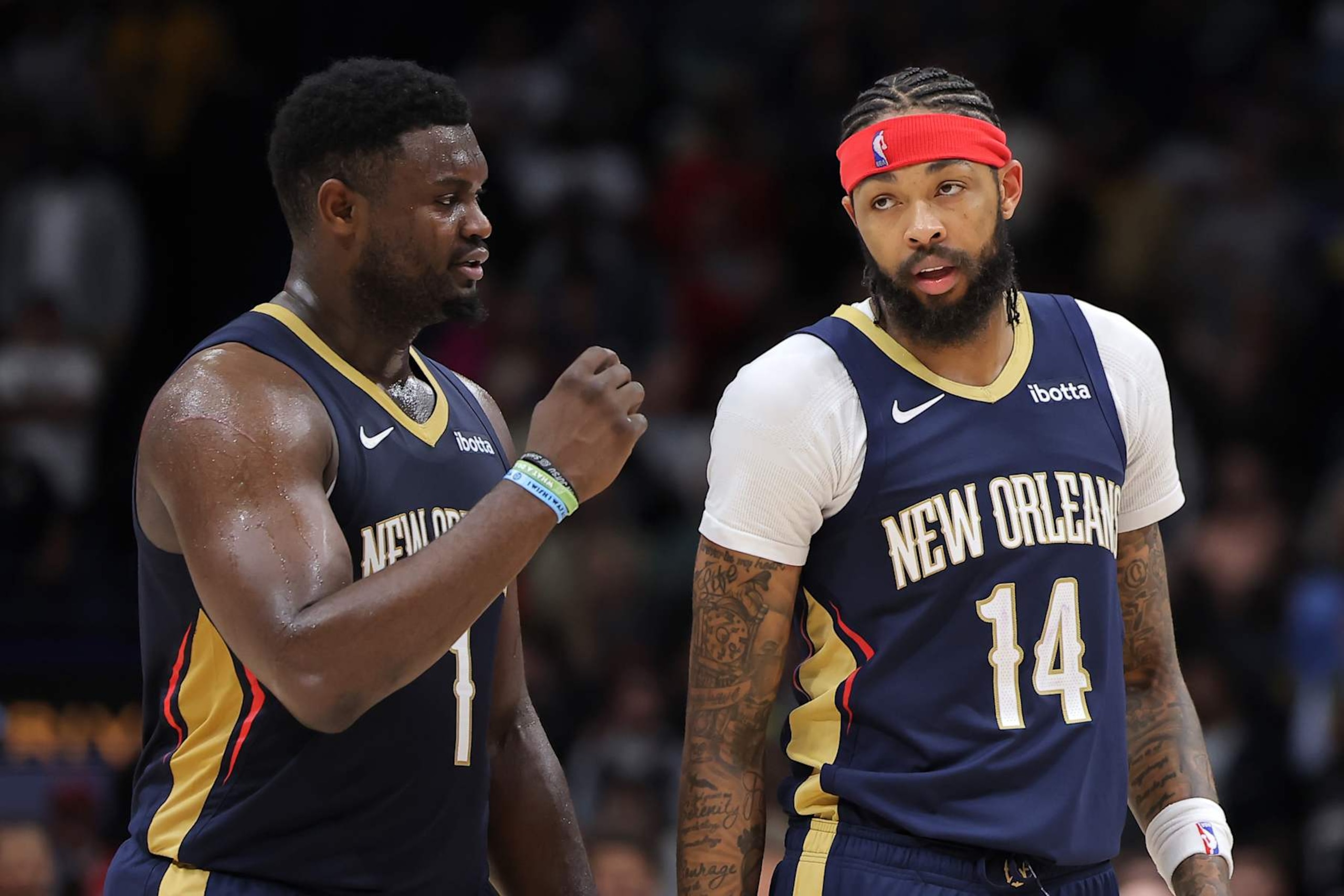 NEW ORLEANS, LOUISIANA - NOVEMBER 22: Zion Williamson #1 and Brandon Ingram #14 of the New Orleans Pelicans talk against the Sacramento Kings during the second half at the Smoothie King Center on November 22, 2023 in New Orleans, Louisiana. NOTE TO USER: User expressly acknowledges and agrees that, by downloading and or using this Photograph, user is consenting to the terms and conditions of the Getty Images License Agreement. (Photo by Jonathan Bachman/Getty Images) NEW ORLEANS, LOUISIANA - NOVEMBER 22: Zion Williamson #1 and Brandon Ingram #14 of the New Orleans Pelicans talk against the Sacramento Kings during the second half at the Smoothie King Center on November 22, 2023 in New Orleans, Louisiana. NOTE TO USER: User expressly acknowledges and agrees that, by downloading and or using this Photograph, user is consenting to the terms and conditions of the Getty Images License Agreement. (Photo by Jonathan Bachman/Getty Images)