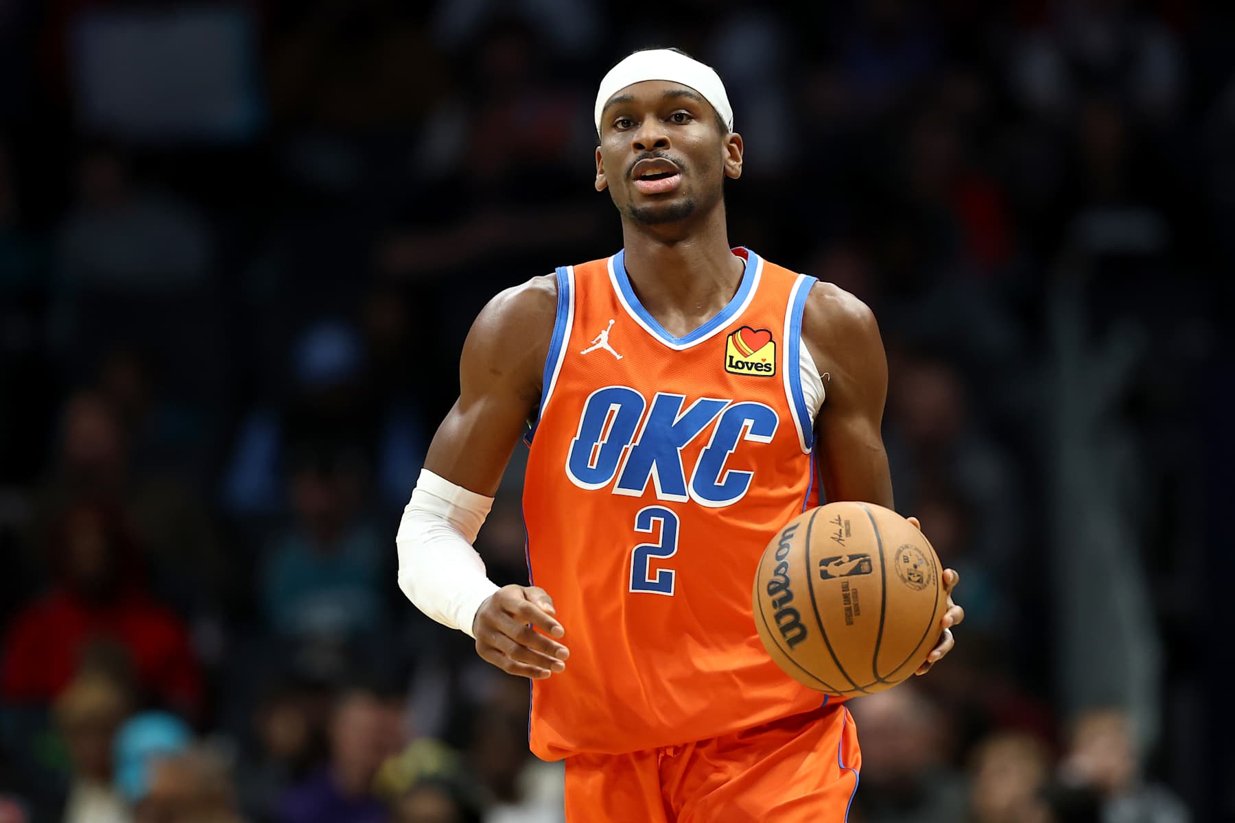 CHARLOTTE, NORTH CAROLINA - DECEMBER 28: Shai Gilgeous-Alexander #2 of the Oklahoma City Thunder brings the ball up court during the first half of the game against the Charlotte Hornets at Spectrum Center on December 28, 2024 in Charlotte, North Carolina. NOTE TO USER: User expressly acknowledges and agrees that, by downloading and or using this photograph, User is consenting to the terms and conditions of the Getty Images License Agreement. (Photo by Jared C. Tilton/Getty Images)