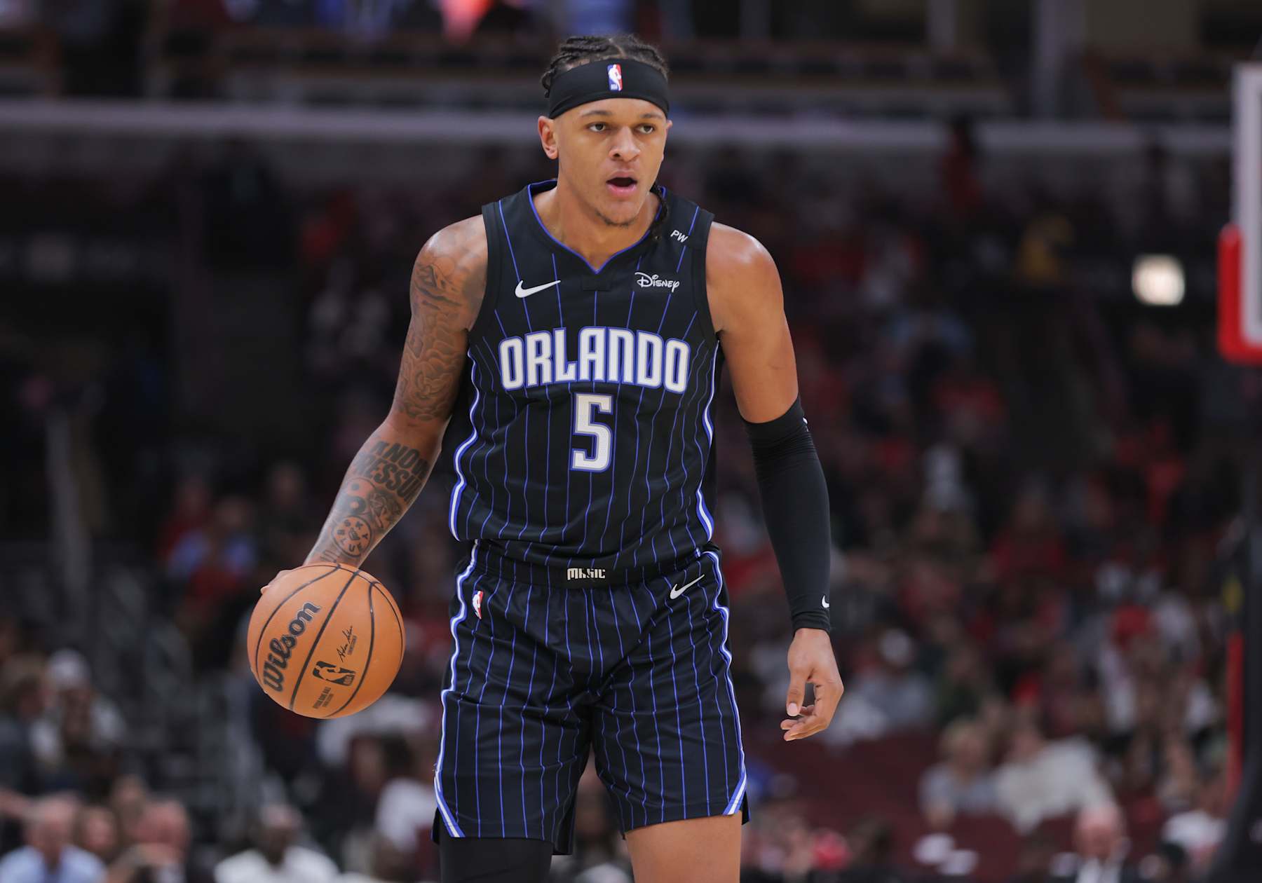 CHICAGO, IL - OCTOBER 30: Orlando Magic forward Paolo Banchero (5) brings the ball up court during the first half against the Chicago Bulls on October 30, 2024 at the United Center in Chicago, Illinois. (Photo by Melissa Tamez/Icon Sportswire via Getty Images)