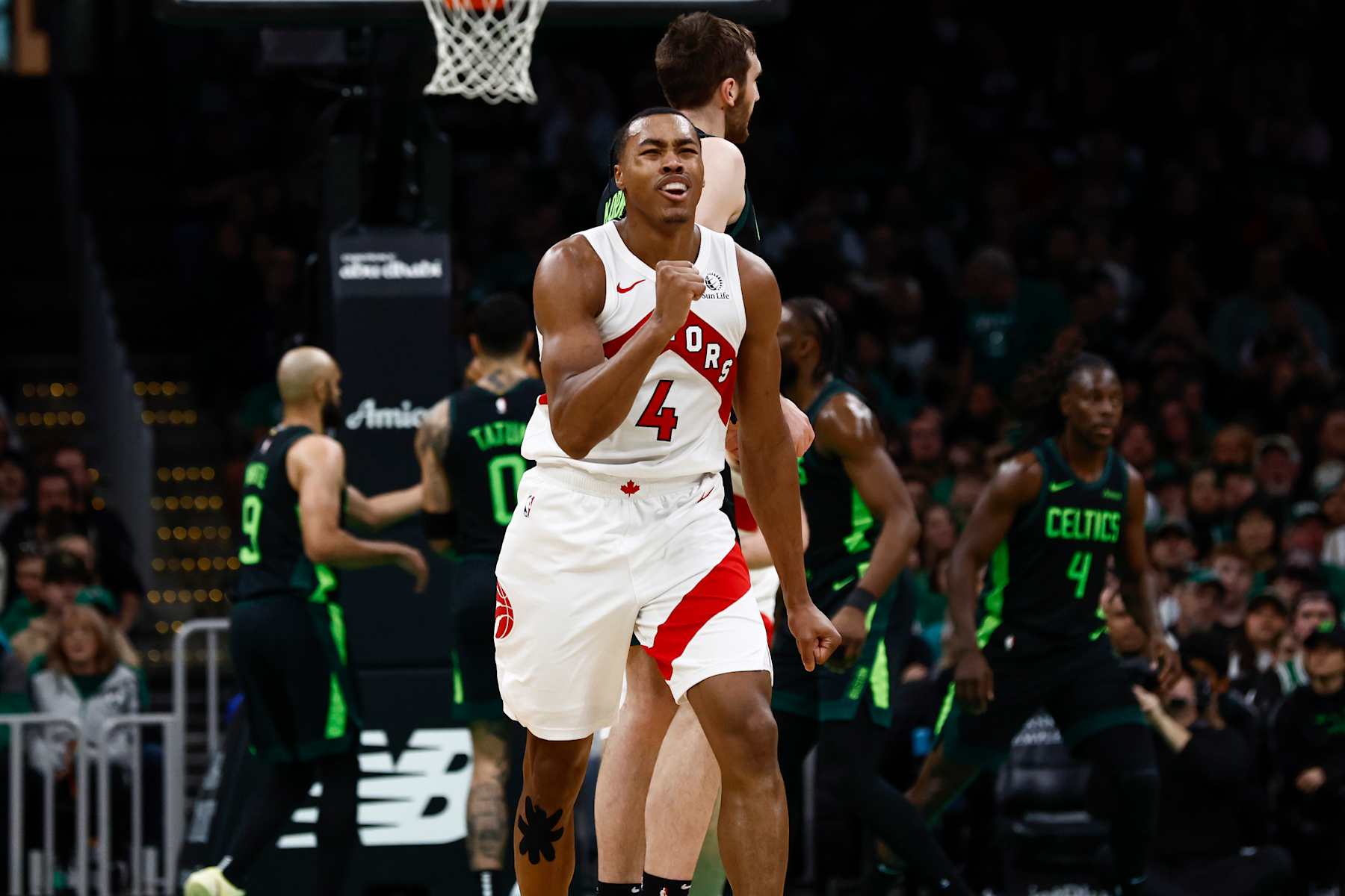 BOSTON, MA - DECEMBER 31: Scottie Barnes #4 of the Toronto Raptors pumps his fist after making a three point basket against the Boston Celtics during the second quarter at TD Garden on December 31, 2024 in Boston, Massachusetts. NOTE TO USER: User expressly acknowledges and agrees that, by downloading and/or using this Photograph, user is consenting to the terms and conditions of the Getty Images License Agreement. (Photo By Winslow Townson/Getty Images)
