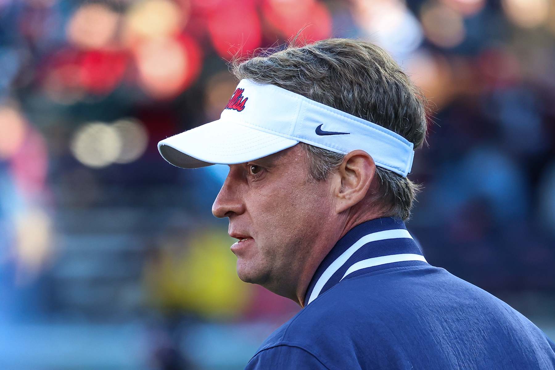 OXFORD, MISSISSIPPI - NOVEMBER 29: Lane Kiffin head coach of the Mississippi Rebels looks on during warm ups prior to the game against the Mississippi State Bulldogs at Vaught-Hemingway Stadium on November 29, 2024 in Oxford, Mississippi. (Photo by Wes Hale/Getty Images)