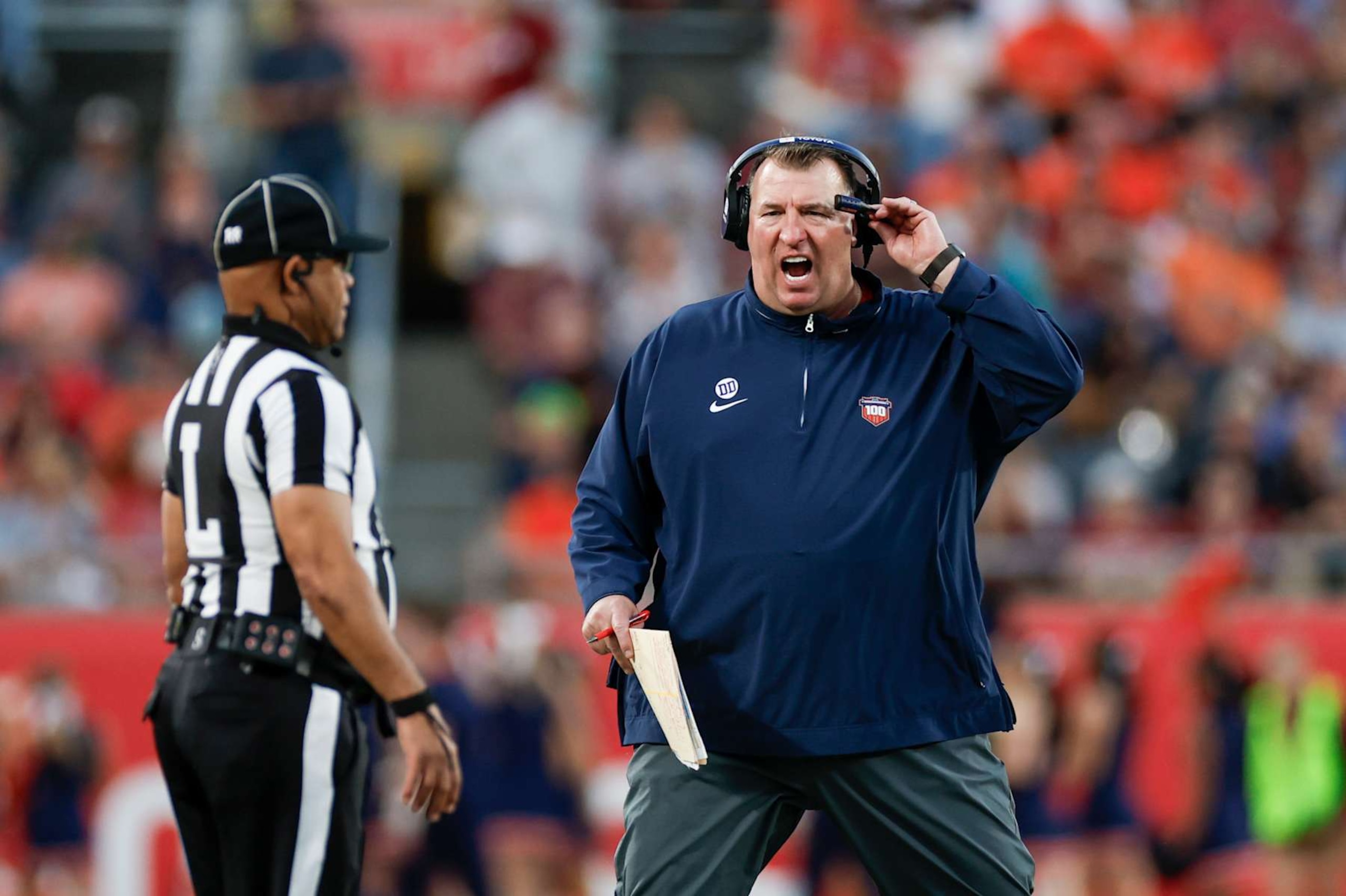 ORLANDO, FL - DECEMBER 31: Illinois Fighting Illini head coach Bret Bielema argues a call during the game between the South Carolina Gamecocks and the Illinois Fighting Illini on December 31, 2024 at Camping World Stadium in Orlando, Fl. (Photo by David Rosenblum/Icon Sportswire via Getty Images) ORLANDO, FL - DECEMBER 31: Illinois Fighting Illini head coach Bret Bielema argues a call during the game between the South Carolina Gamecocks and the Illinois Fighting Illini on December 31, 2024 at Camping World Stadium in Orlando, Fl. (Photo by David Rosenblum/Icon Sportswire via Getty Images)