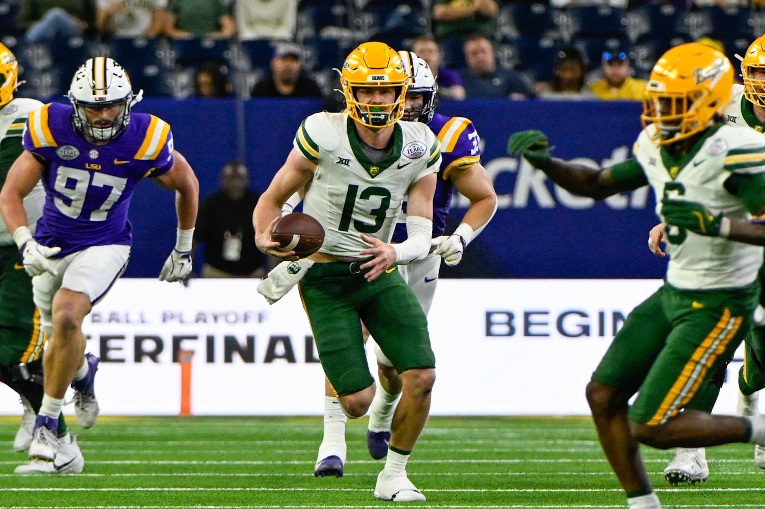 HOUSTON, TX - DECEMBER 31: Baylor Bears quarterback Sawyer Robertson (13) scrambles from the pocket for first down yardage during the football game between the Baylor Bears and LSU Tigers on December 31, 2024, at NRG Stadium in Houston, Texas. (Photo by Ken Murray/Icon Sportswire via Getty Images) HOUSTON, TX - DECEMBER 31: Baylor Bears quarterback Sawyer Robertson (13) scrambles from the pocket for first down yardage during the football game between the Baylor Bears and LSU Tigers on December 31, 2024, at NRG Stadium in Houston, Texas. (Photo by Ken Murray/Icon Sportswire via Getty Images)
