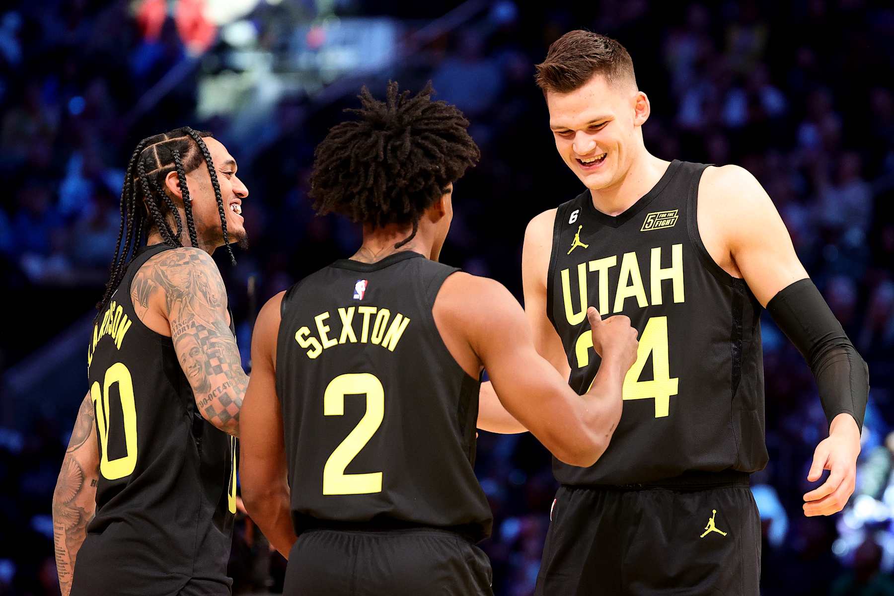 SALT LAKE CITY, UTAH - FEBRUARY 18: Collin Sexton #2, Walker Kessler #24, and Jordan Clarkson #00 of the Utah Jazz react in the 2023 NBA All Star KIA Skills Challenge at Vivint Arena on February 18, 2023 in Salt Lake City, Utah. NOTE TO USER: User expressly acknowledges and agrees that, by downloading and or using this photograph, User is consenting to the terms and conditions of the Getty Images License Agreement. (Photo by Tim Nwachukwu/Getty Images)