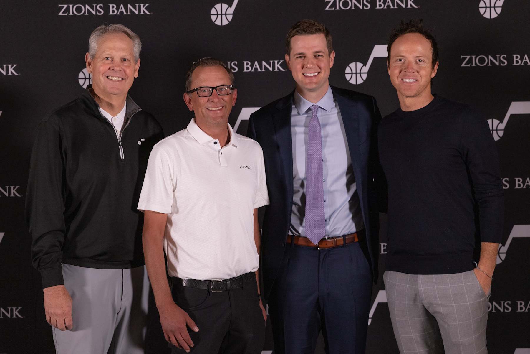 SALT LAKE CITY, UT - JULY 05:  Danny Ainge CEO of Basketball Operations, Justin Zanik General Manager, Will Hardy Head Coach and Ryan Smith Owner of the Utah Jazz speak pose for a photograph after a press conference about Will Hardy as the new Head Coach of the Utah Jazz at vivint.SmartHome Arena on July 05, 2022 in Salt Lake City, Utah. NOTE TO USER: User expressly acknowledges and agrees that, by downloading and or using this Photograph, User is consenting to the terms and conditions of the Getty Images License Agreement. Mandatory Copyright Notice: Copyright 2022 NBAE (Photo by Melissa Majchrzak/NBAE via Getty Images)