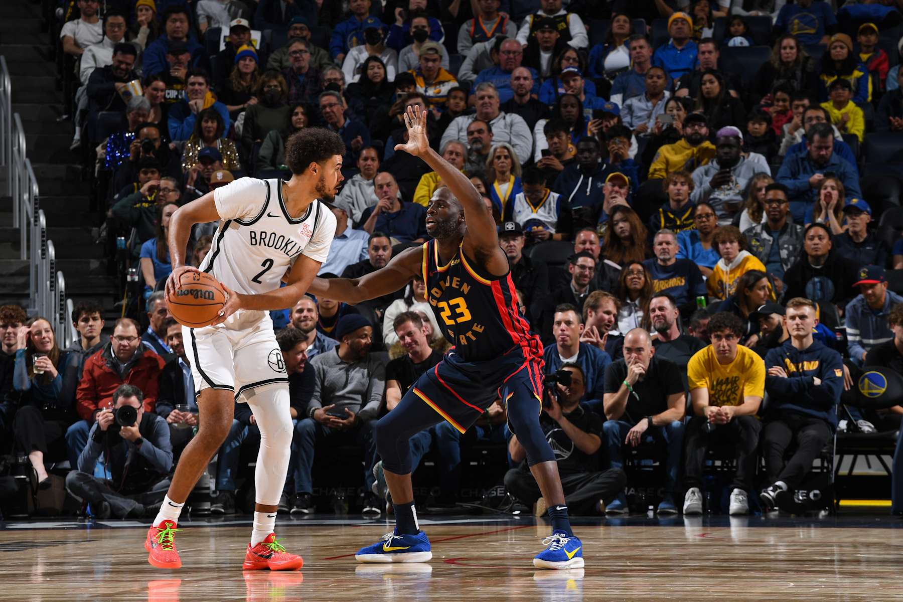 Cameron Johnson and Draymond Green