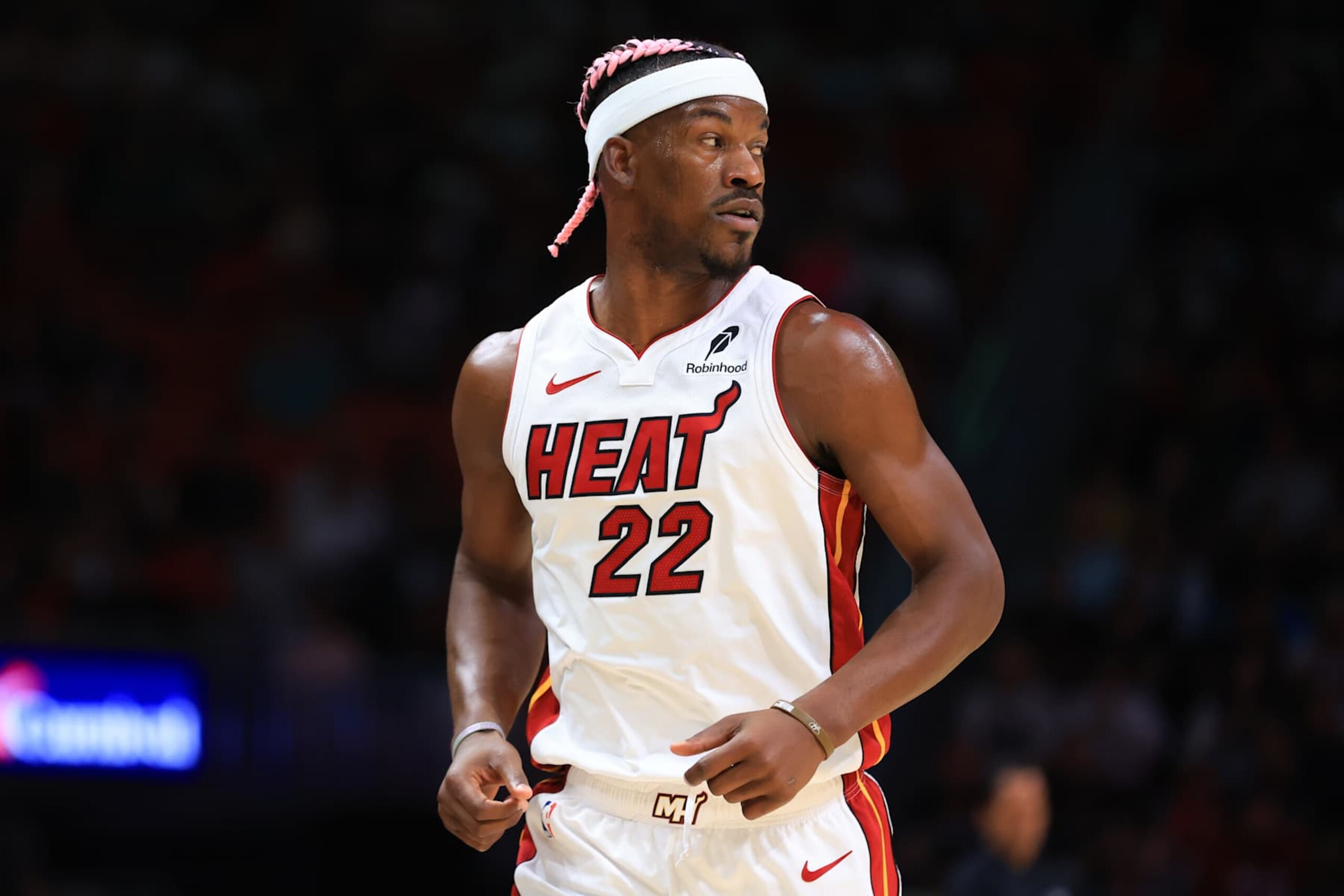 MIAMI, FLORIDA - JANUARY 01: Jimmy Butler #22 of the Miami Heat looks on during the first quarter of a game against the New Orleans Pelicans at Kaseya Center on January 01, 2025 in Miami, Florida. NOTE TO USER: User expressly acknowledges and agrees that, by downloading and or using this photograph, User is consenting to the terms and conditions of the Getty Images License Agreement. (Photo by Megan Briggs/Getty Images)