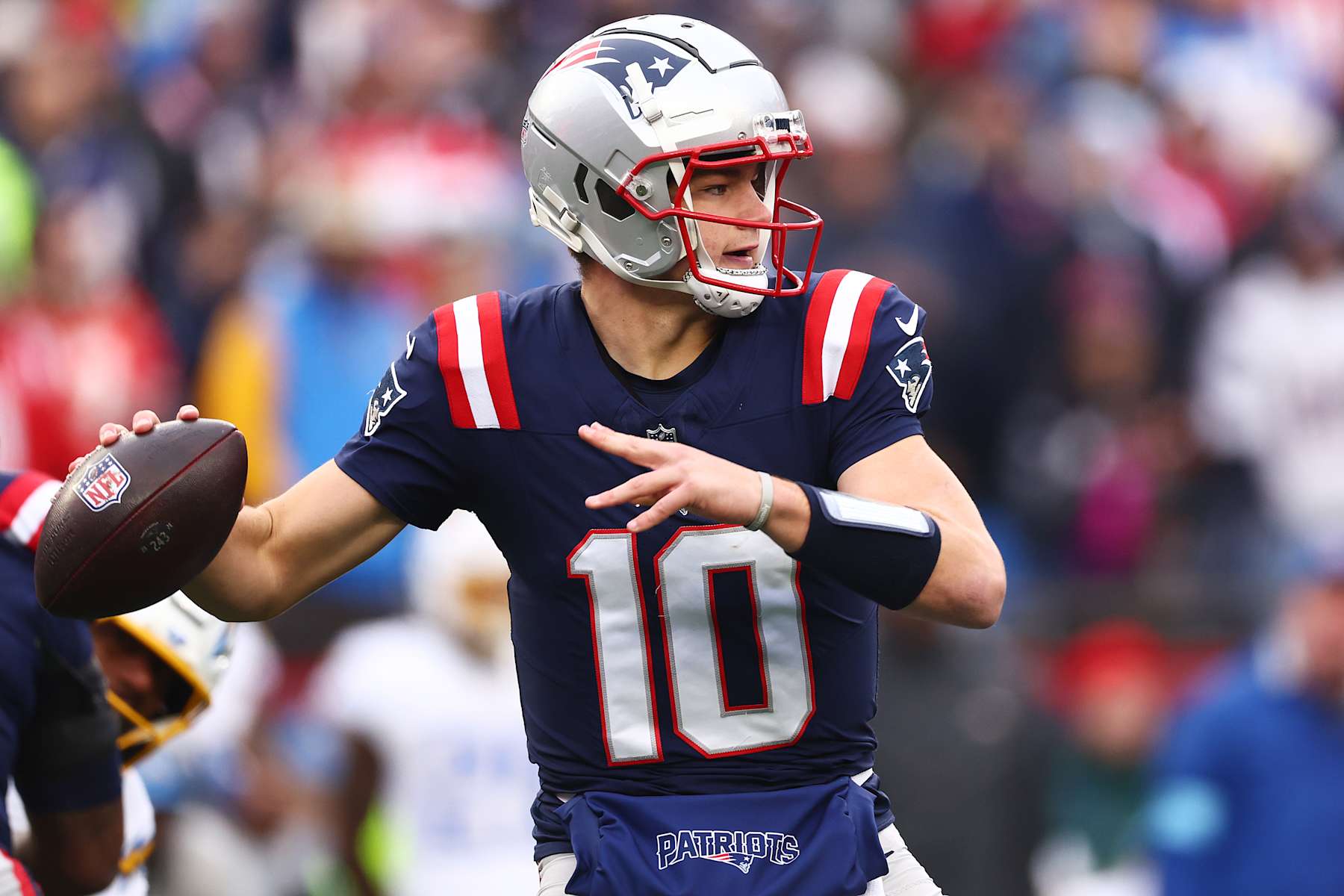 FOXBOROUGH, MASSACHUSETTS - DECEMBER 28: Drake Maye #10 of the New England Patriots throws a pass against the Los Angeles Chargers at Gillette Stadium on December 28, 2024 in Foxborough, Massachusetts. (Photo by Maddie Meyer/Getty Images)