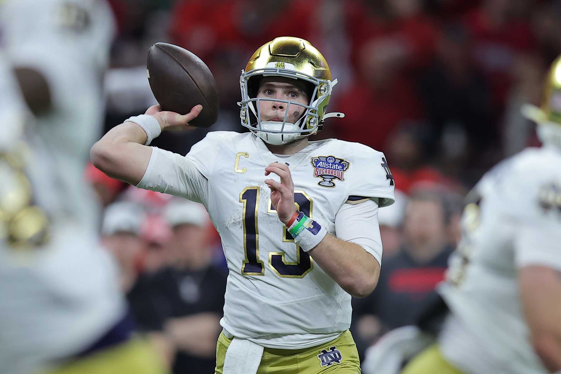 NEW ORLEANS, LOUISIANA - JANUARY 02: Riley Leonard #13 of the Notre Dame Fighting Irish throws a pass during the fourth quarter against the Georgia Bulldogs during the 91st Allstate Sugar Bowl at Caesars Superdome on January 02, 2025 in New Orleans, Louisiana. (Photo by Jonathan Bachman/Getty Images)