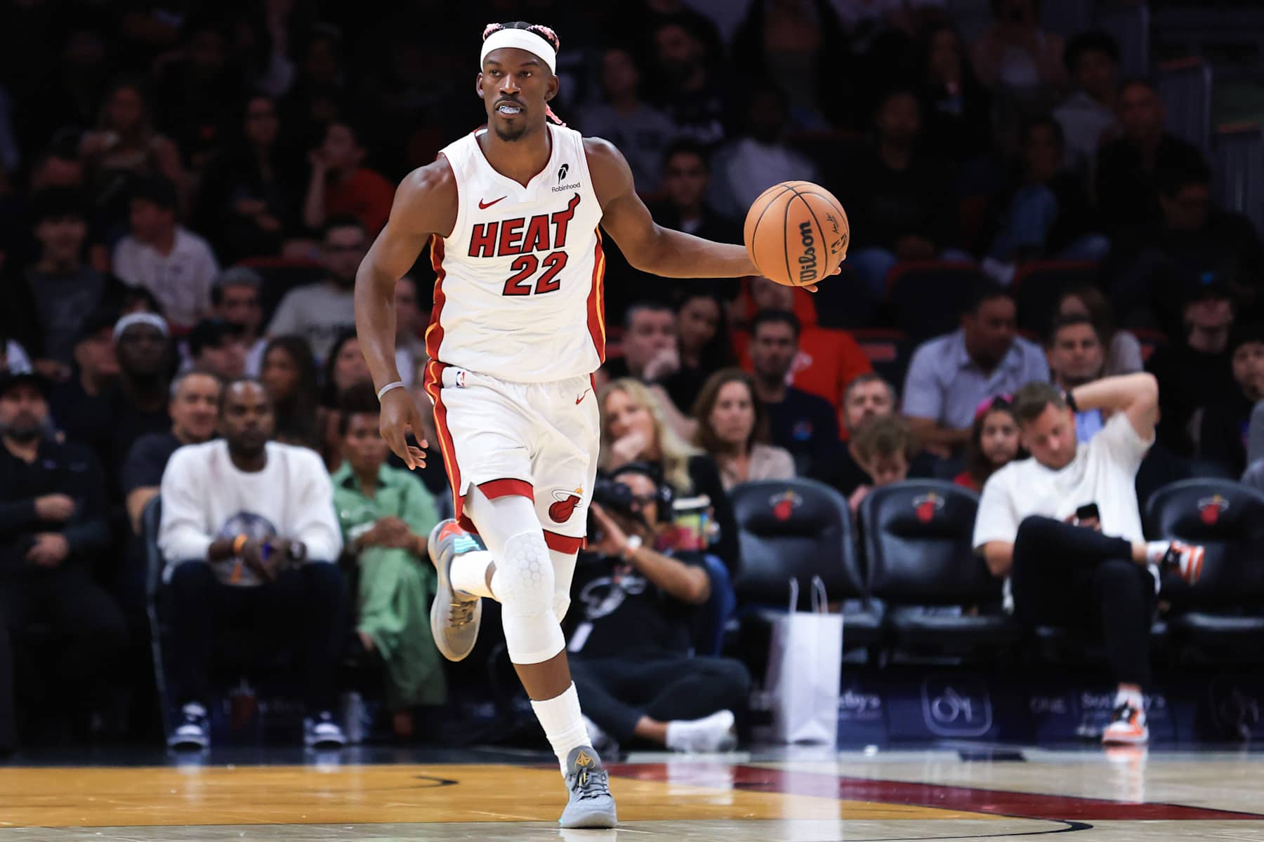 MIAMI, FLORIDA - JANUARY 01: Jimmy Butler #22 of the Miami Heat dribbles the ball against the New Orleans Pelicans during the second quarter of the game at Kaseya Center on January 01, 2025 in Miami, Florida. NOTE TO USER: User expressly acknowledges and agrees that, by downloading and or using this photograph, User is consenting to the terms and conditions of the Getty Images License Agreement. (Photo by Megan Briggs/Getty Images)