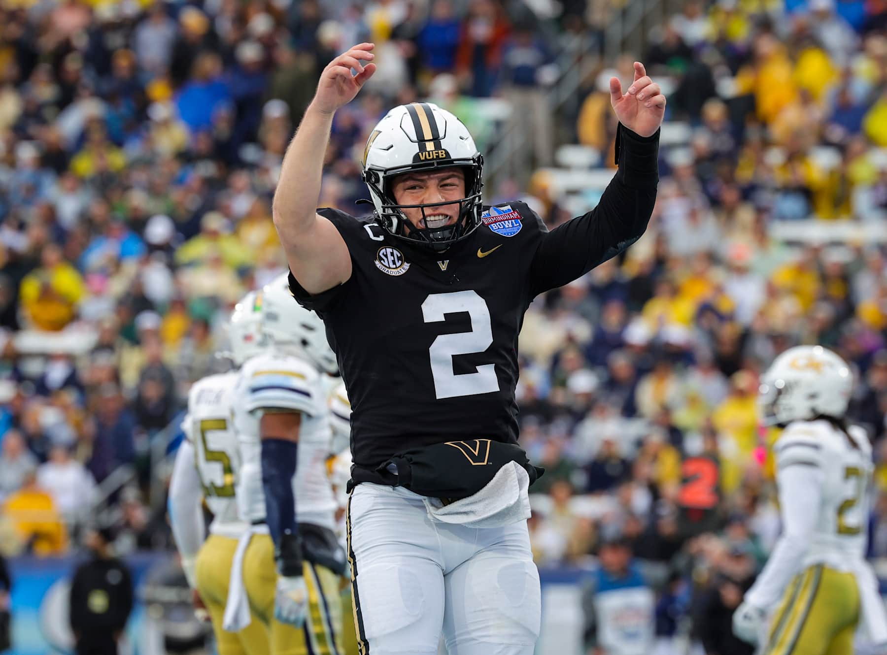 BIRMINGHAM, ALABAMA - DECEMBER 27: Diego Pavia #2 of the Vanderbilt Commodores celebrates a first half touchdown against the Georgia Tech Yellow Jackets in the Birmingham Bowl at Protective Stadium on December 27, 2024 in Birmingham, Alabama. (Photo by Brandon Sumrall/Getty Images)
