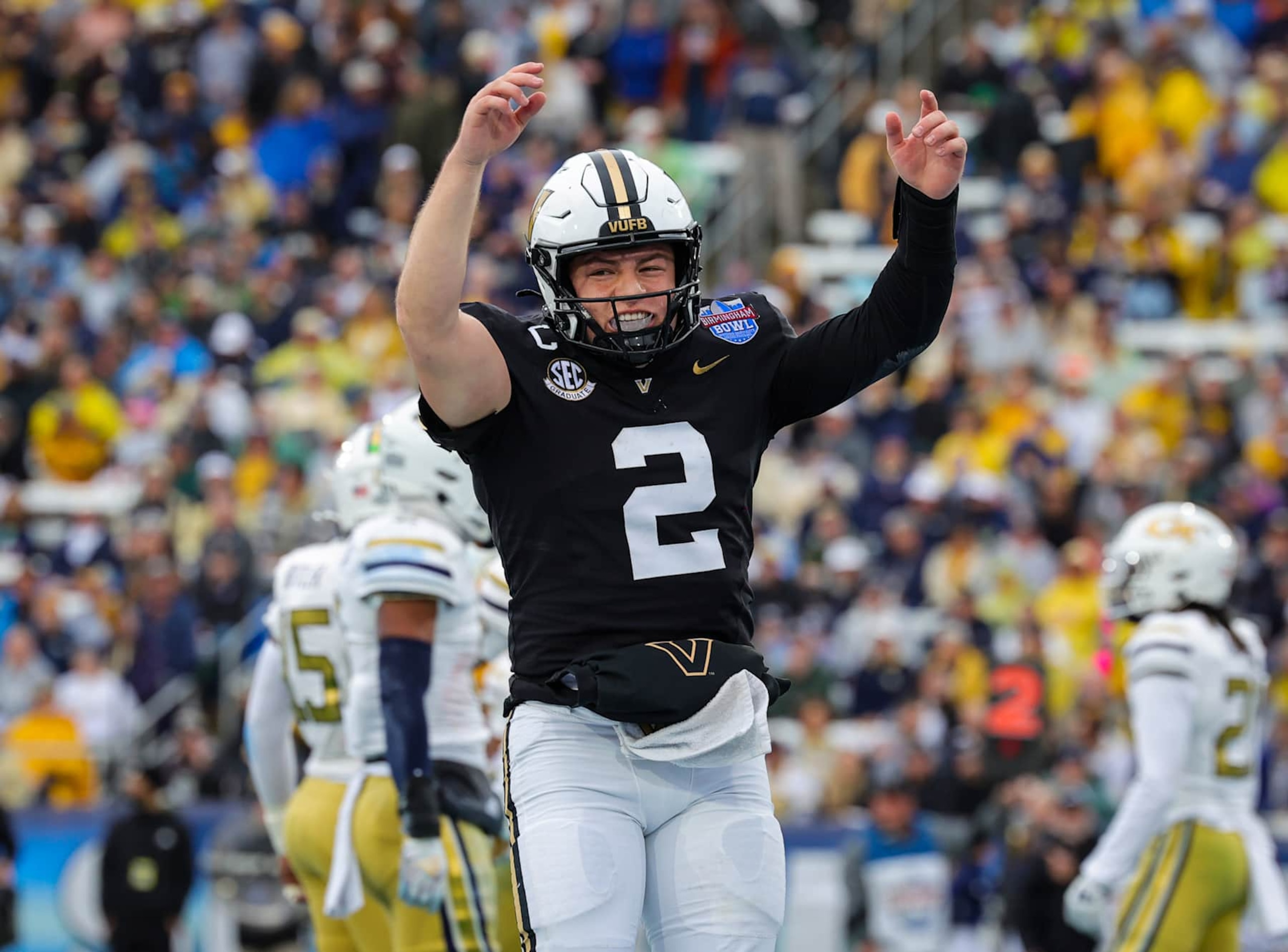 BIRMINGHAM, ALABAMA - DECEMBER 27: Diego Pavia #2 of the Vanderbilt Commodores celebrates a first half touchdown against the Georgia Tech Yellow Jackets in the Birmingham Bowl at Protective Stadium on December 27, 2024 in Birmingham, Alabama. (Photo by Brandon Sumrall/Getty Images)