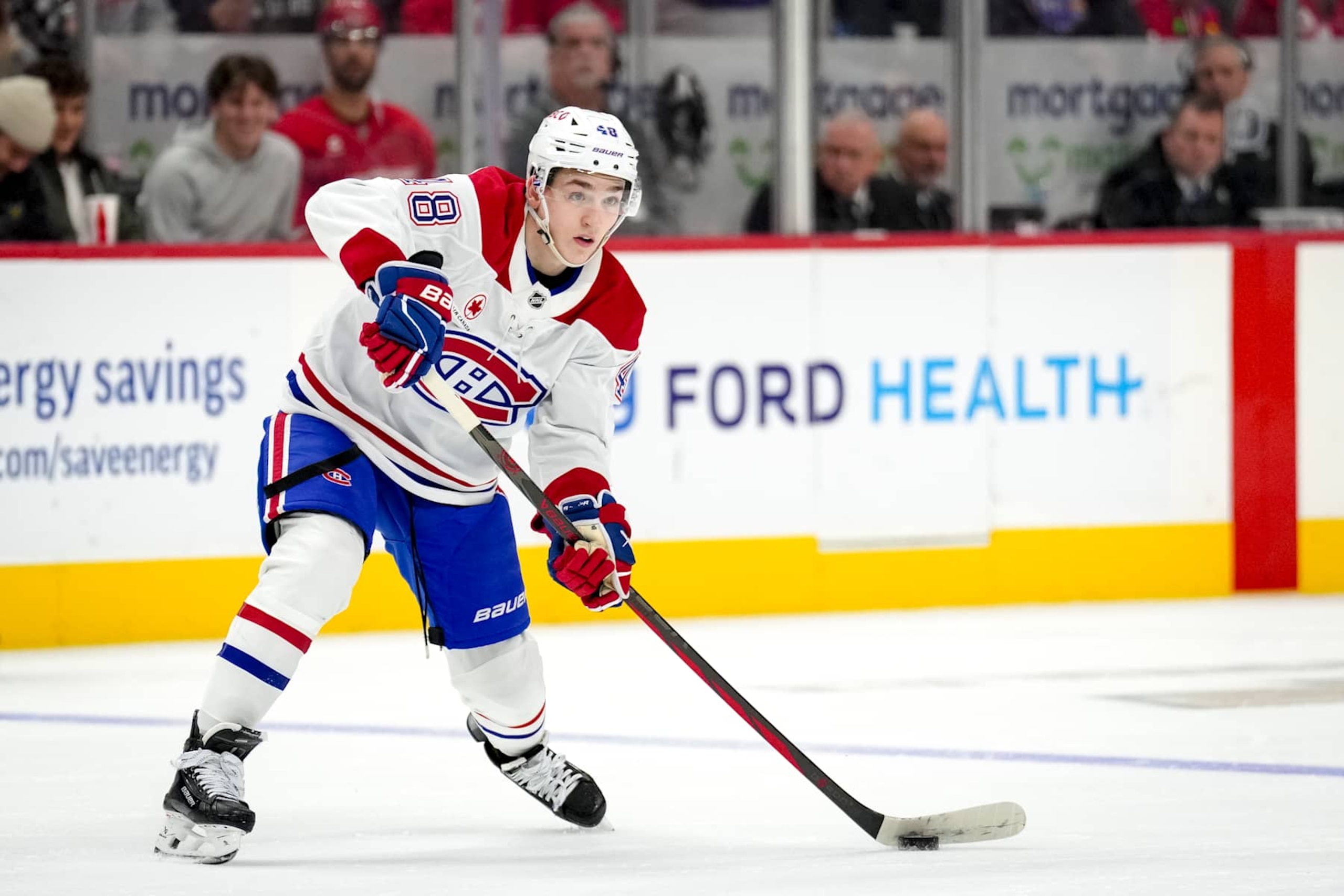 DETROIT, MICHIGAN - DECEMBER 20: Lane Hutson #48 of the Montreal Canadiens passes the puck against the Detroit Red Wings at Little Caesars Arena on December 20, 2024 in Detroit, Michigan. (Photo by Nic Antaya/Getty Images) DETROIT, MICHIGAN - DECEMBER 20: Lane Hutson #48 of the Montreal Canadiens passes the puck against the Detroit Red Wings at Little Caesars Arena on December 20, 2024 in Detroit, Michigan. (Photo by Nic Antaya/Getty Images)