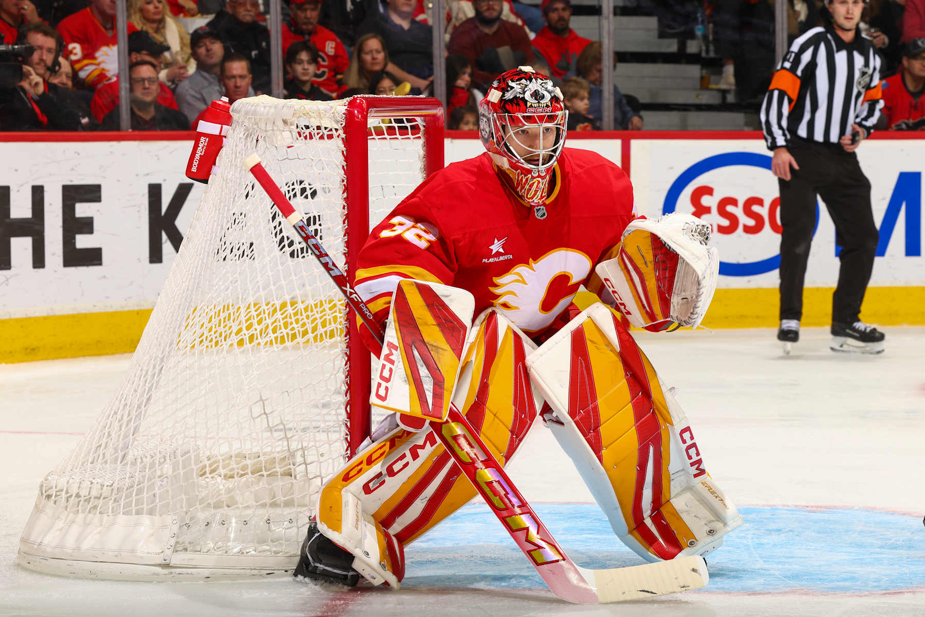 CALGARY, ALBERTA - DECEMBER 21: Dustin Wolf #32 of the Calgary Flames skates against the Chicago Blackhawks at the Scotiabank Saddledome on December 21, 2024 in Calgary, Alberta. (Photo by Gerry Thomas/NHLI via Getty Images)