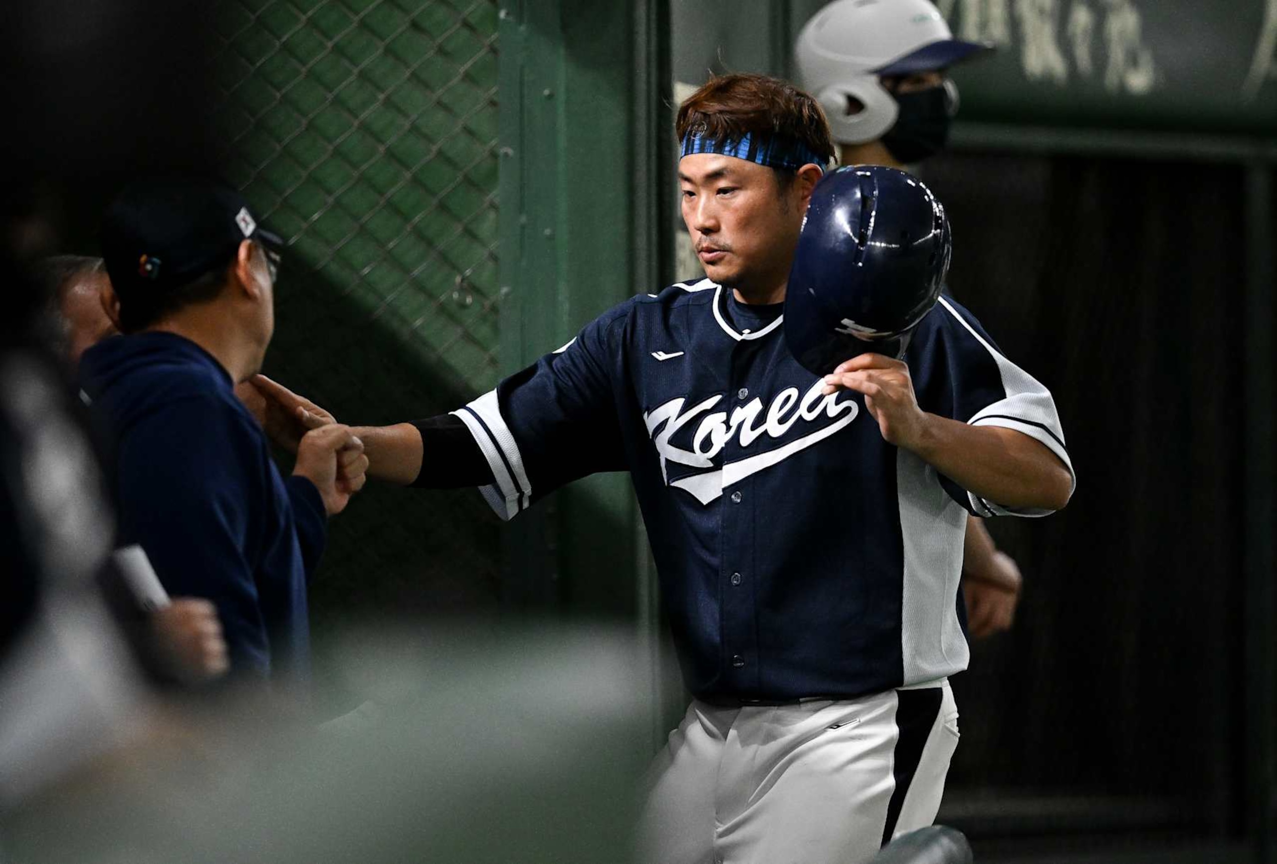 TOKYO, JAPAN - MARCH 13: Jiyoung Lee #56 of Team Korea scores after Hyeseong Kim #2 of Team Korea hit a sacrifice fly at the top of the 2nd inning during the World Baseball Classic Pool B game between Korea and China at Tokyo Dome on March 13, 2023 in Tokyo, Japan. (Photo by Gene Wang/Getty Images) TOKYO, JAPAN - MARCH 13: Jiyoung Lee #56 of Team Korea scores after Hyeseong Kim #2 of Team Korea hit a sacrifice fly at the top of the 2nd inning during the World Baseball Classic Pool B game between Korea and China at Tokyo Dome on March 13, 2023 in Tokyo, Japan. (Photo by Gene Wang/Getty Images)