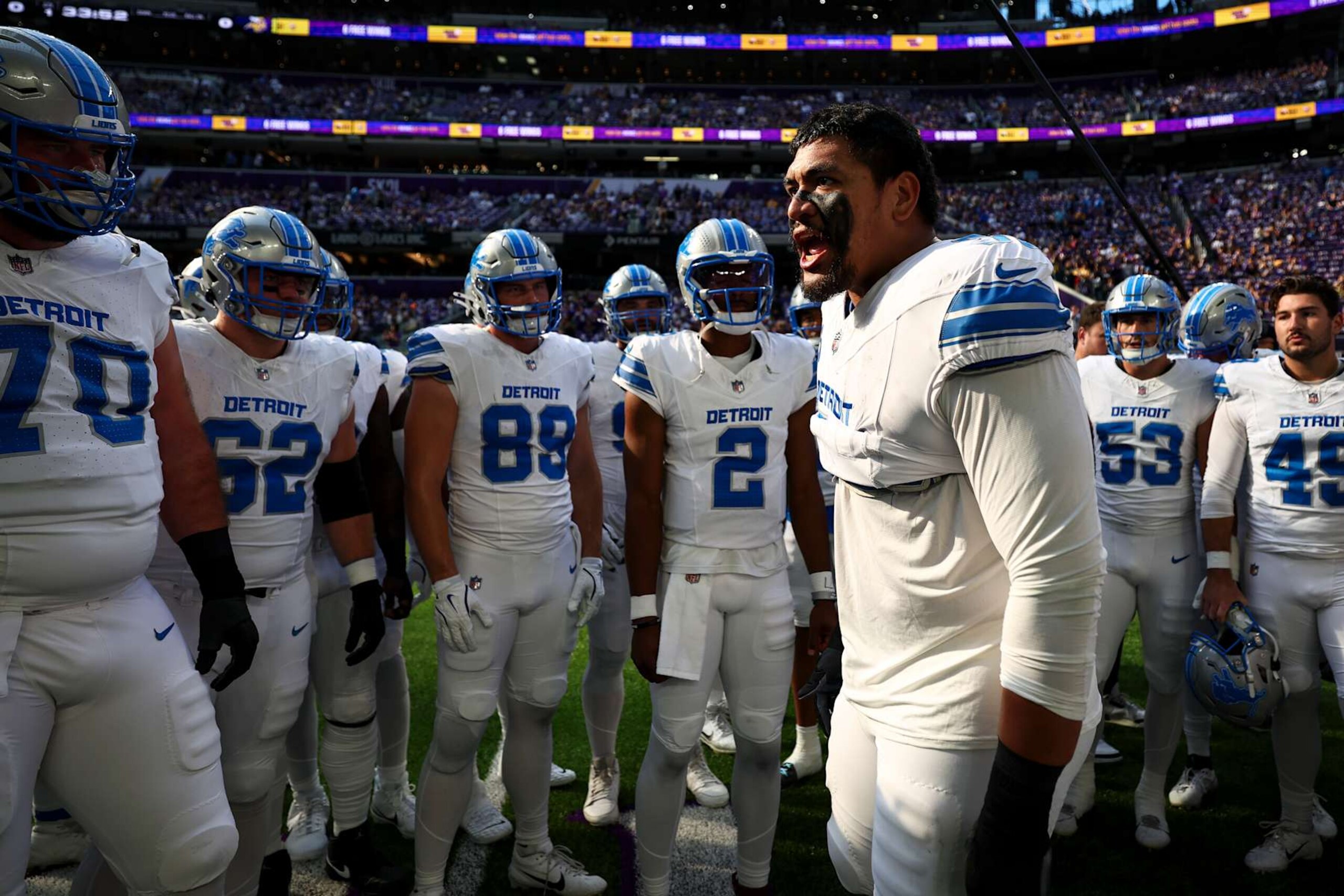 MINNEAPOLIS, MINNESOTA - OCTOBER 20: Penei Sewell #58 of the Detroit Lions gives a speech in the team huddle prior to an NFL football game against the Minnesota Vikings at U.S. Bank Stadium on October 20, 2024 in Minneapolis, Minnesota. (Photo by Kevin Sabitus/Getty Images) MINNEAPOLIS, MINNESOTA - OCTOBER 20: Penei Sewell #58 of the Detroit Lions gives a speech in the team huddle prior to an NFL football game against the Minnesota Vikings at U.S. Bank Stadium on October 20, 2024 in Minneapolis, Minnesota. (Photo by Kevin Sabitus/Getty Images)