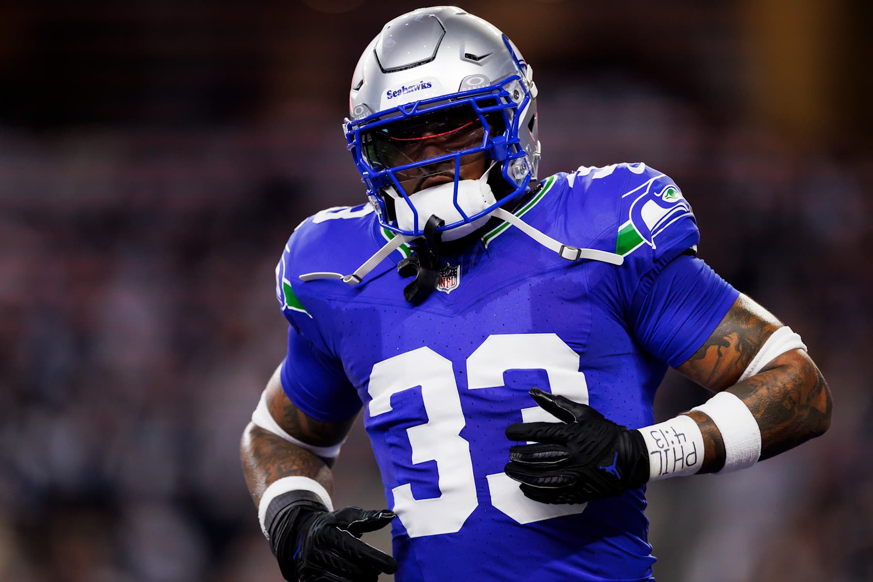 ARLINGTON, TEXAS - NOVEMBER 30: Jamal Adams #33 of the Seattle Seahawks celebrates after a play during an NFL football game against the Dallas Cowboys at AT&T Stadium on November 30, 2023 in Arlington, Texas. (Photo by Ryan Kang/Getty Images)