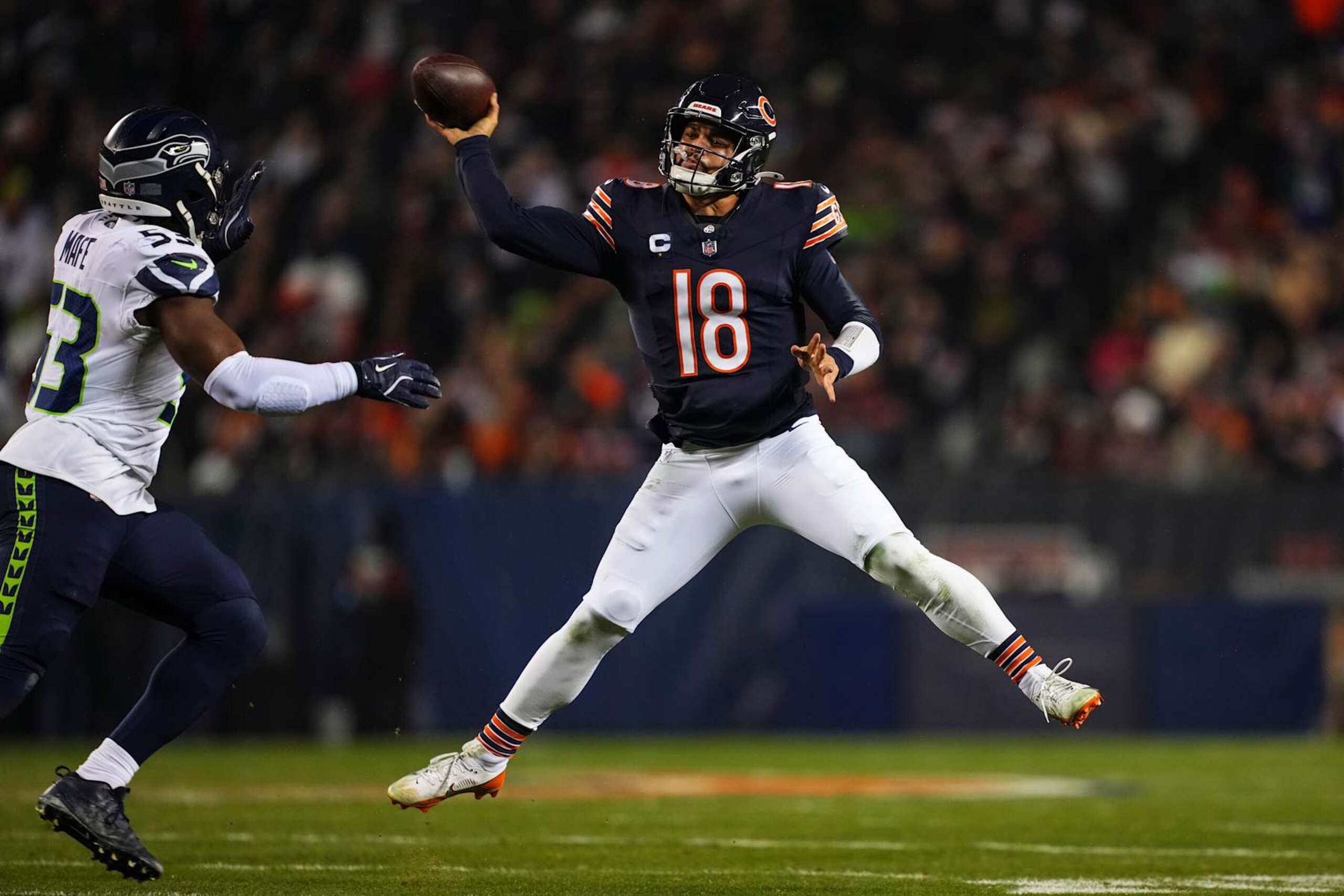 CHICAGO, IL - DECEMBER 26: Caleb Williams #18 of the Chicago Bears throws the ball during an NFL football game against the Seattle Seahawks at Soldier Field on December 26, 2024 in Chicago, Illinois. (Photo by Cooper Neill/Getty Images) CHICAGO, IL - DECEMBER 26: Caleb Williams #18 of the Chicago Bears throws the ball during an NFL football game against the Seattle Seahawks at Soldier Field on December 26, 2024 in Chicago, Illinois. (Photo by Cooper Neill/Getty Images)