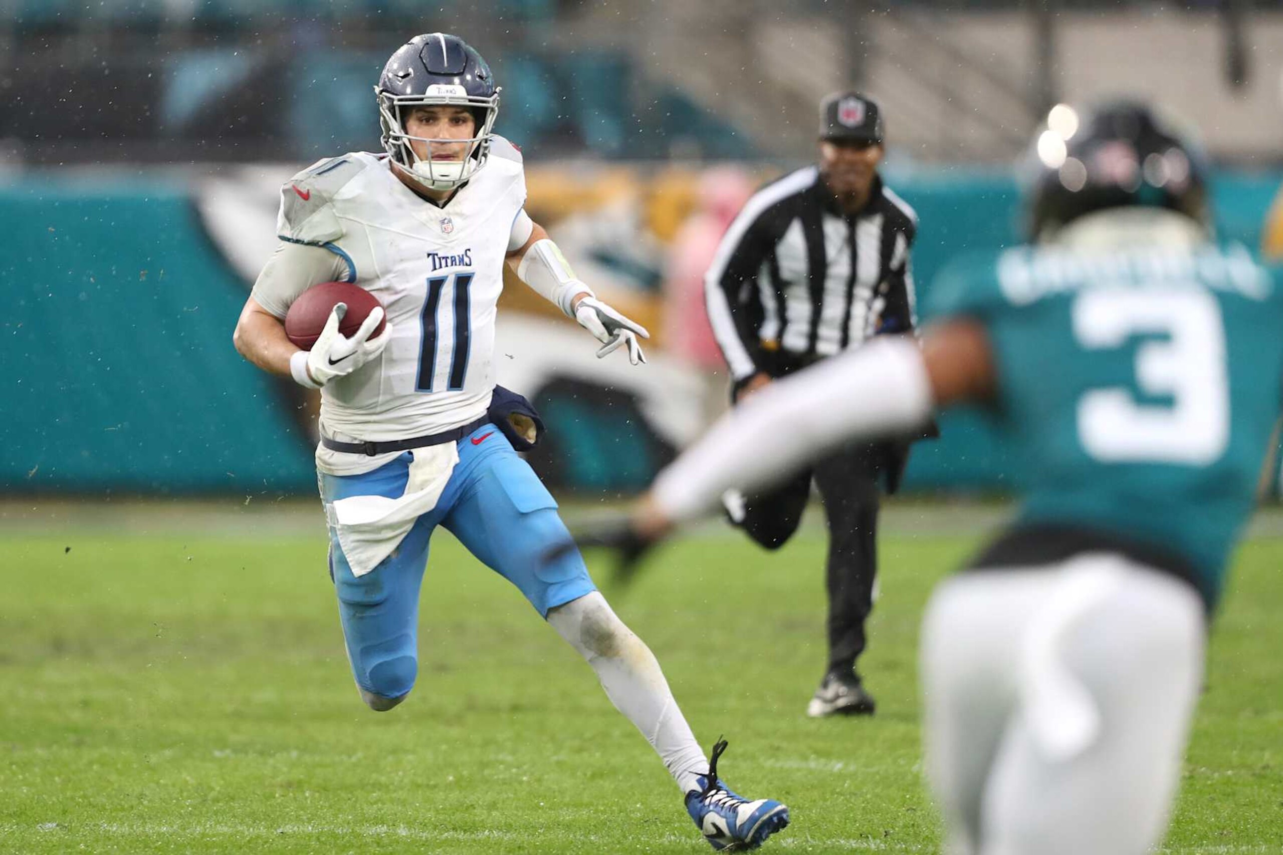 JACKSONVILLE, FLORIDA - DECEMBER 29: Mason Rudolph #11 of the Tennessee Titans runs for yardage during the first half against the Jacksonville Jaguars at EverBank Stadium on December 29, 2024 in Jacksonville, Florida. (Photo by Courtney Culbreath/Getty Images) JACKSONVILLE, FLORIDA - DECEMBER 29: Mason Rudolph #11 of the Tennessee Titans runs for yardage during the first half against the Jacksonville Jaguars at EverBank Stadium on December 29, 2024 in Jacksonville, Florida. (Photo by Courtney Culbreath/Getty Images)