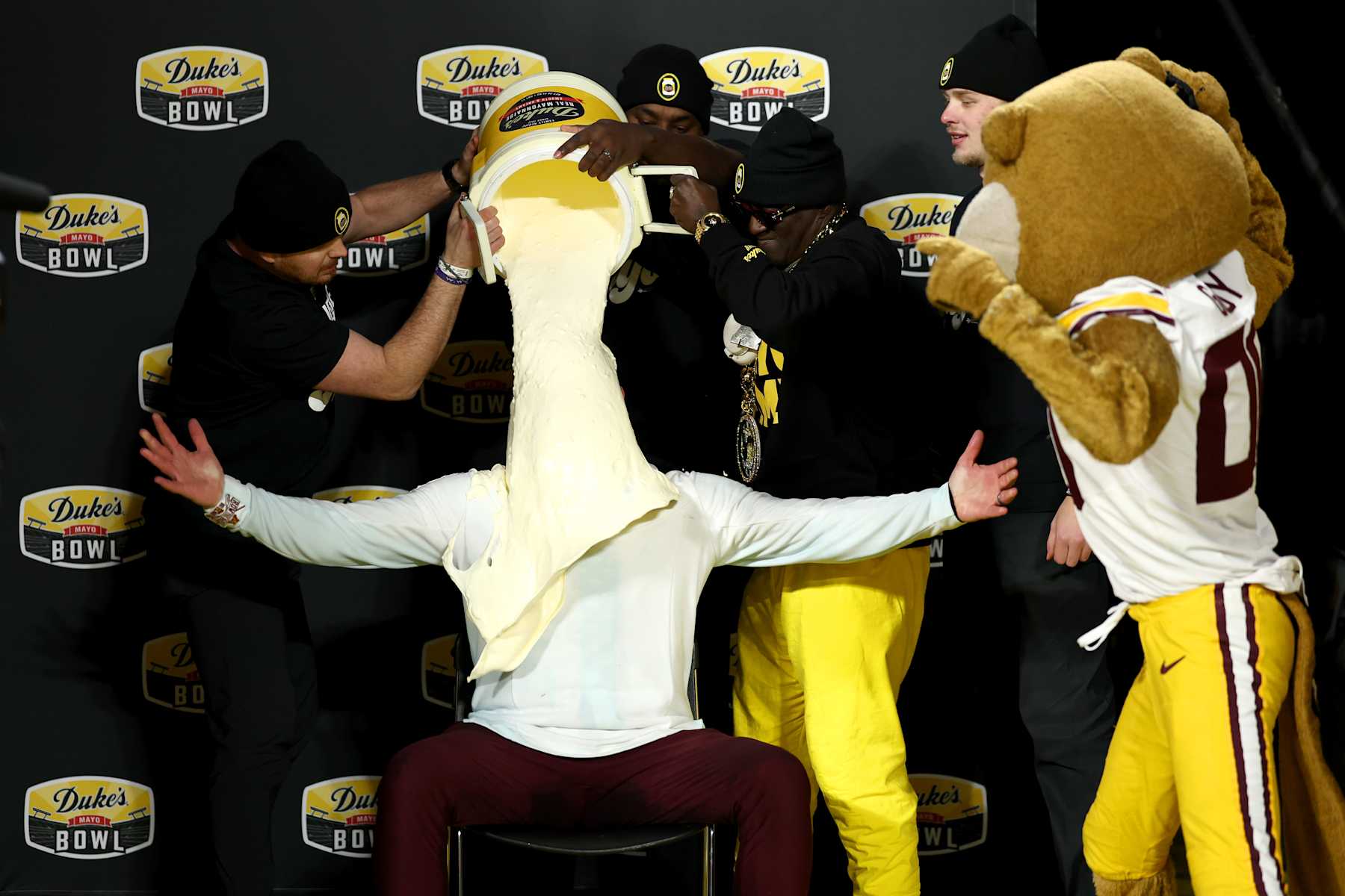 CHARLOTTE, NORTH CAROLINA - JANUARY 03: Head coach P.J. Fleck of the Minnesota Golden Gophers gets a mayo bath after winning the Duke's Mayo Bowl against the Virginia Tech Hokies at Bank of America Stadium on January 03, 2025 in Charlotte, North Carolina.  (Photo by Jared C. Tilton/Getty Images)