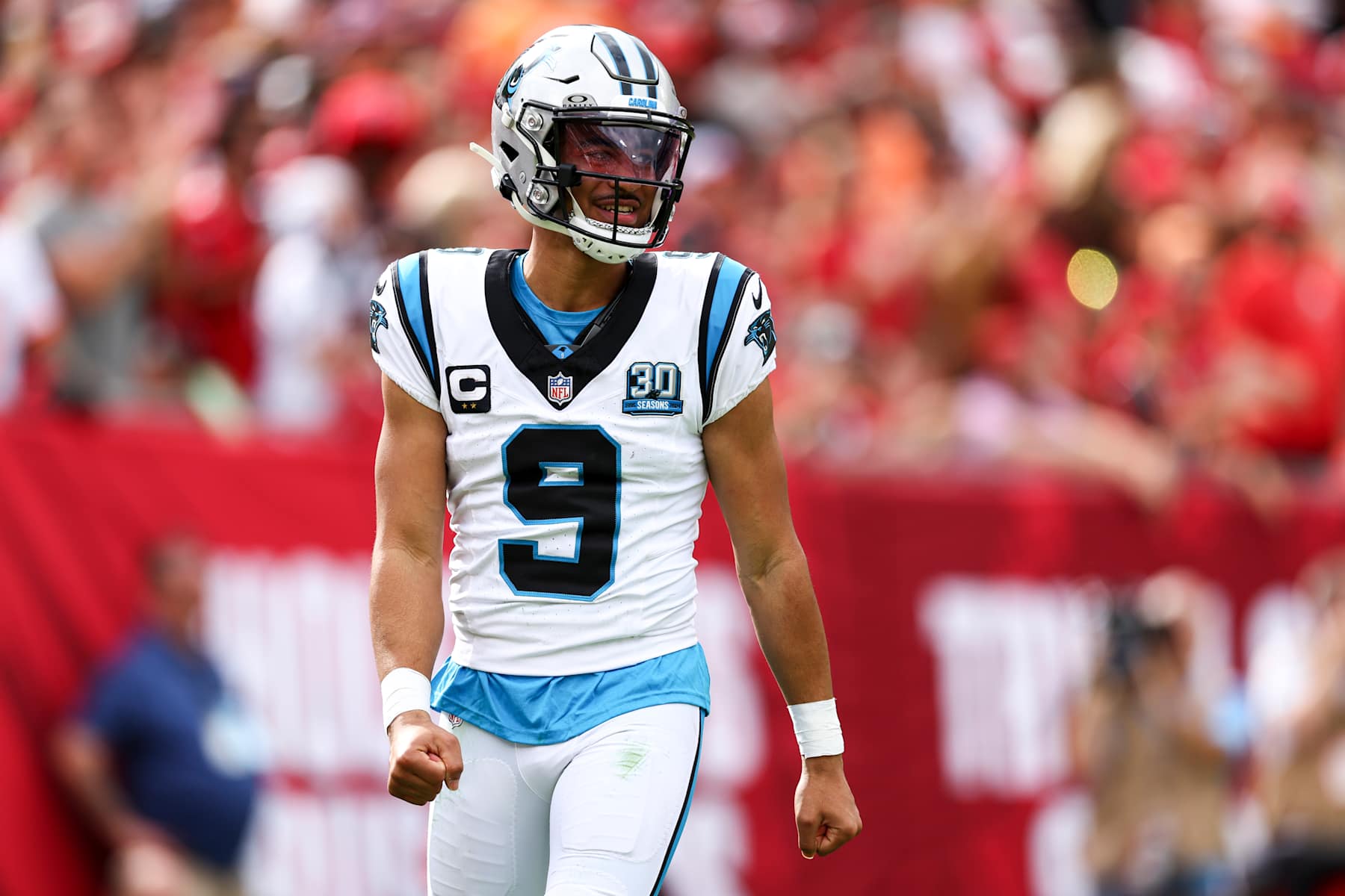 TAMPA, FLORIDA - DECEMBER 29: Bryce Young #9 of the Carolina Panthers celebrates after a play during the first half of an NFL football game against the Tampa Bay Buccaneers at Raymond James Stadium on December 29, 2024 in Tampa, Florida. (Photo by Kevin Sabitus/Getty Images)