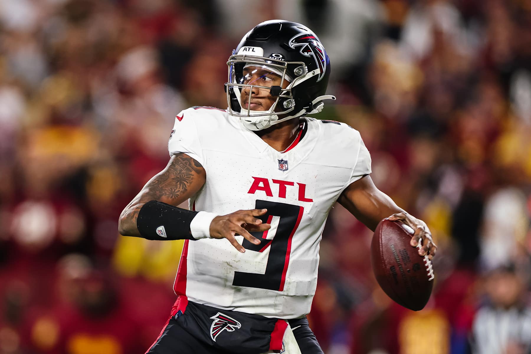 LANDOVER, MD - DECEMBER 29: Michael Penix Jr. #9 of the Atlanta Falcons attempts a pass against the Washington Commanders during the second half of the game at Northwest Stadium on December 29, 2024 in Landover, Maryland. (Photo by Scott Taetsch/Getty Images)