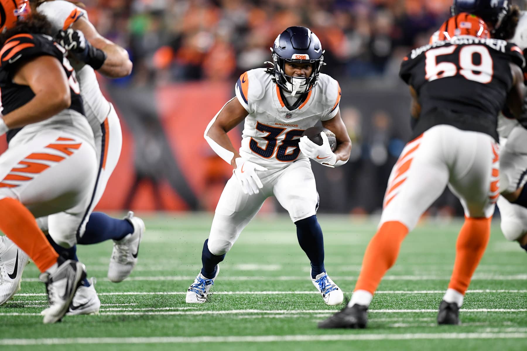 CINCINNATI, OH - DECEMBER 28: Denver Broncos Running Back Jaleel McLaughlin (38) advances the ball during the NFL football game between the Denver Broncos and the Cincinnati Bengals on December 28, 2024, at Paycor Stadium in Cincinnati, Ohio. (Photo by Michael Allio/Icon Sportswire via Getty Images)
