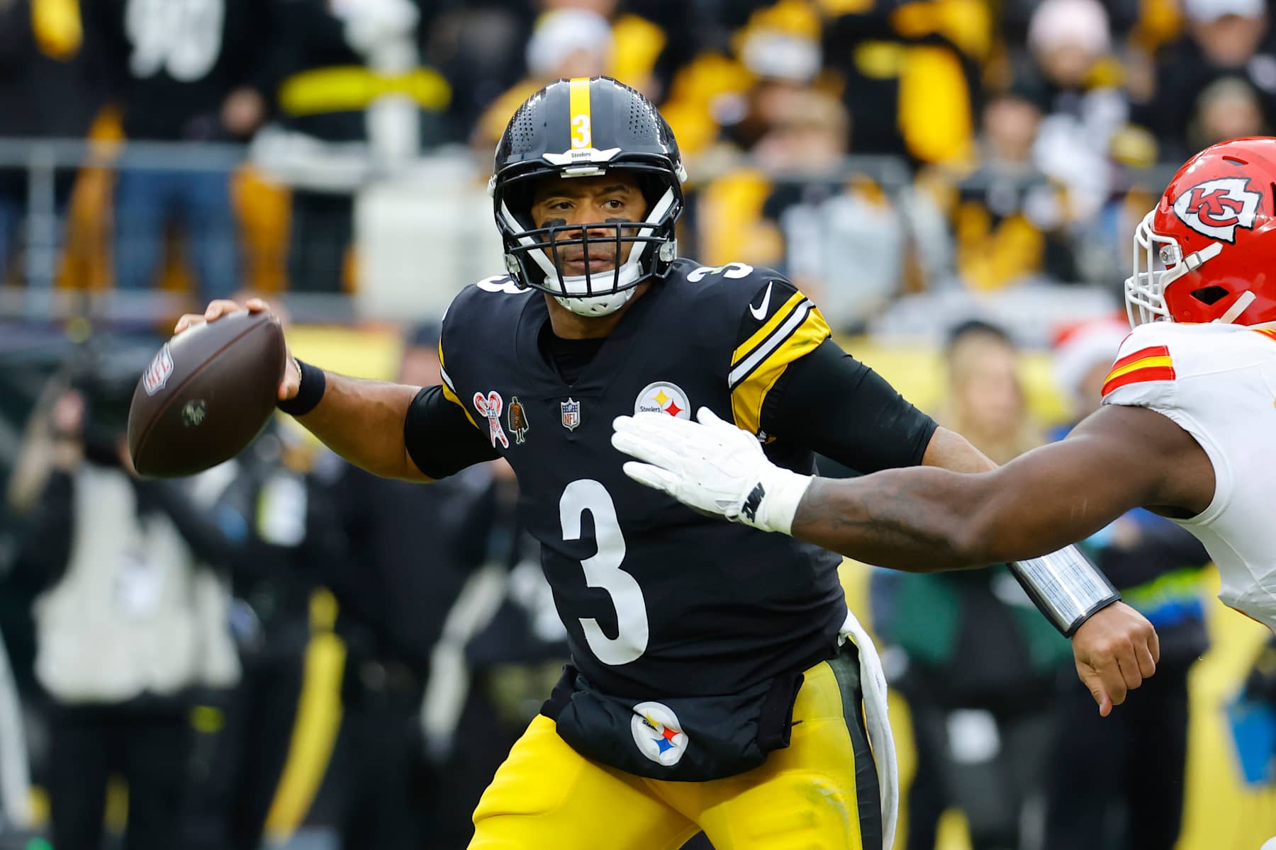 PITTSBURGH, PENNSYLVANIA - DECEMBER 25: Russell Wilson #3 of the Pittsburgh Steelers is pressured by Tershawn Wharton #98 of the Kansas City Chiefs during the second half at Acrisure Stadium on December 25, 2024 in Pittsburgh, Pennsylvania. (Photo by Justin K. Aller/Getty Images)