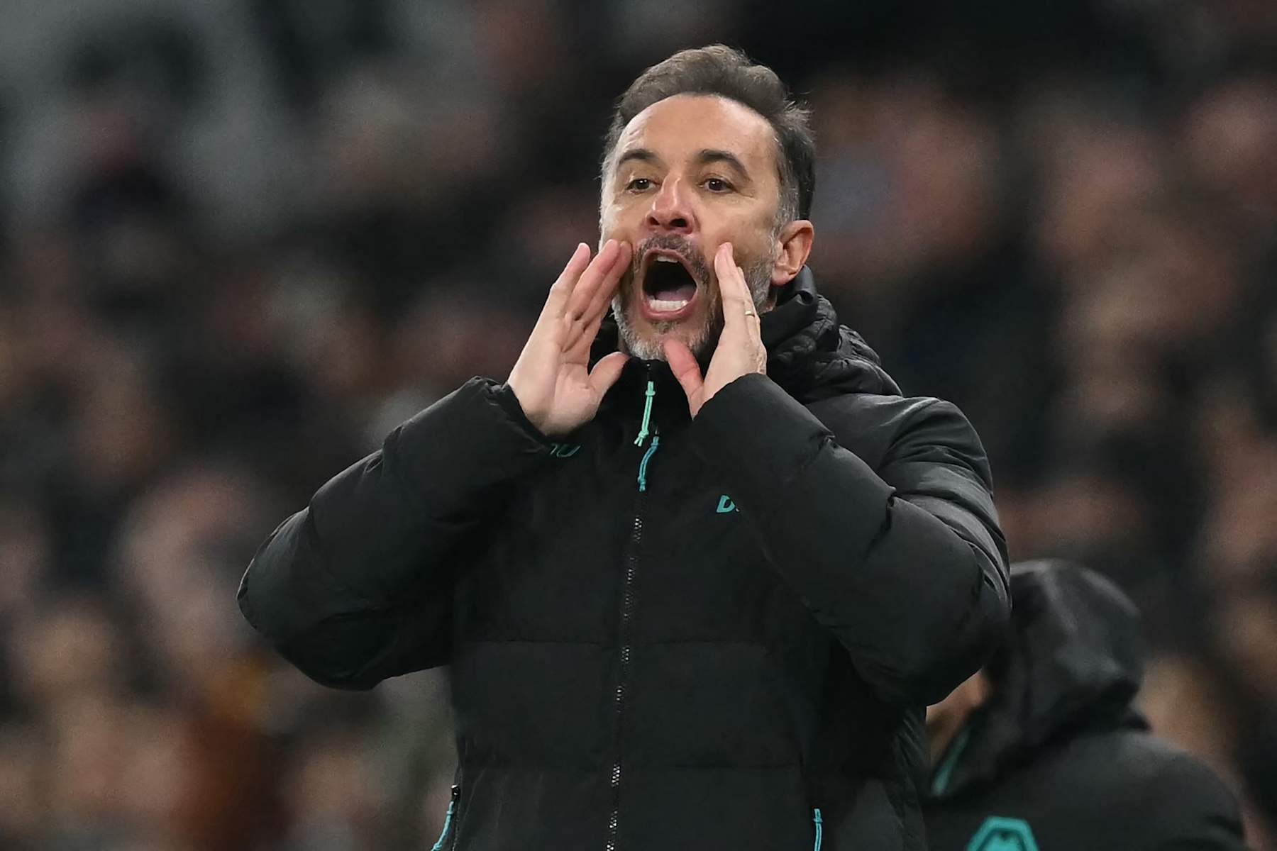 Wolverhampton Wanderers' Portuguese head coach Vitor Pereira gestures on the touchline during the English Premier League football match between Tottenham Hotspur and Wolverhampton Wanderers at the Tottenham Hotspur Stadium in London, on December 29, 2024. (Photo by Glyn KIRK / AFP) / RESTRICTED TO EDITORIAL USE. No use with unauthorized audio, video, data, fixture lists, club/league logos or 'live' services. Online in-match use limited to 120 images. An additional 40 images may be used in extra time. No video emulation. Social media in-match use limited to 120 images. An additional 40 images may be used in extra time. No use in betting publications, games or single club/league/player publications. /  (Photo by GLYN KIRK/AFP via Getty Images)
