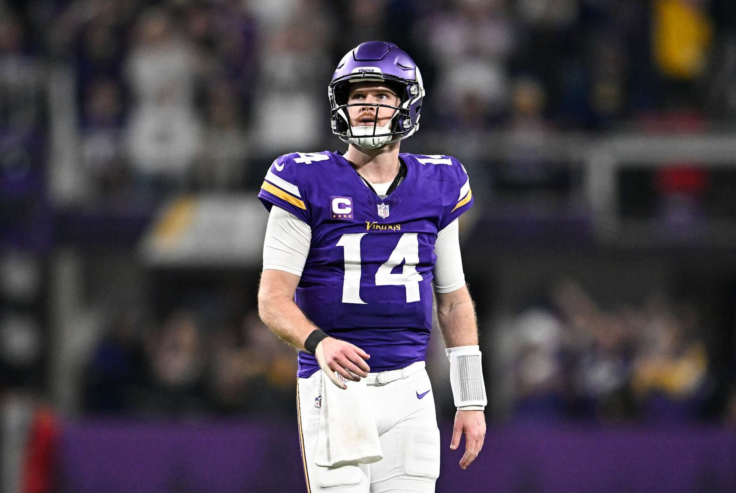 MINNEAPOLIS, MINNESOTA - DECEMBER 29: Quarterback Sam Darnold #14 of the Minnesota Vikings looks on after a play during the third quarter against the Green Bay Packers at U.S. Bank Stadium on December 29, 2024 in Minneapolis, Minnesota. (Photo by Stephen Maturen/Getty Images) MINNEAPOLIS, MINNESOTA - DECEMBER 29: Quarterback Sam Darnold #14 of the Minnesota Vikings looks on after a play during the third quarter against the Green Bay Packers at U.S. Bank Stadium on December 29, 2024 in Minneapolis, Minnesota. (Photo by Stephen Maturen/Getty Images)