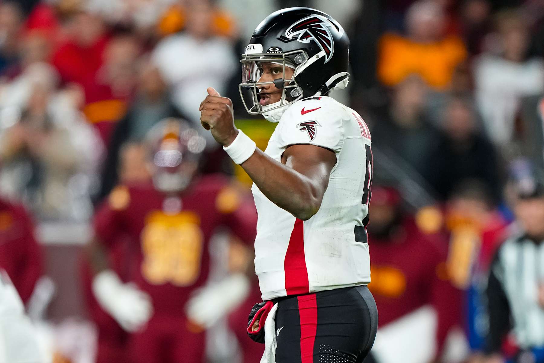 LANDOVER, MARYLAND - DECEMBER 29: Quarterback Michael Penix Jr. #9 of the Atlanta Falcons gets set during the fourth quarter of an NFL football game against the Washington Commanders, at Northwest Stadium on December 29, 2024 in Landover, Maryland. (Photo by Todd Rosenberg/Getty Images)