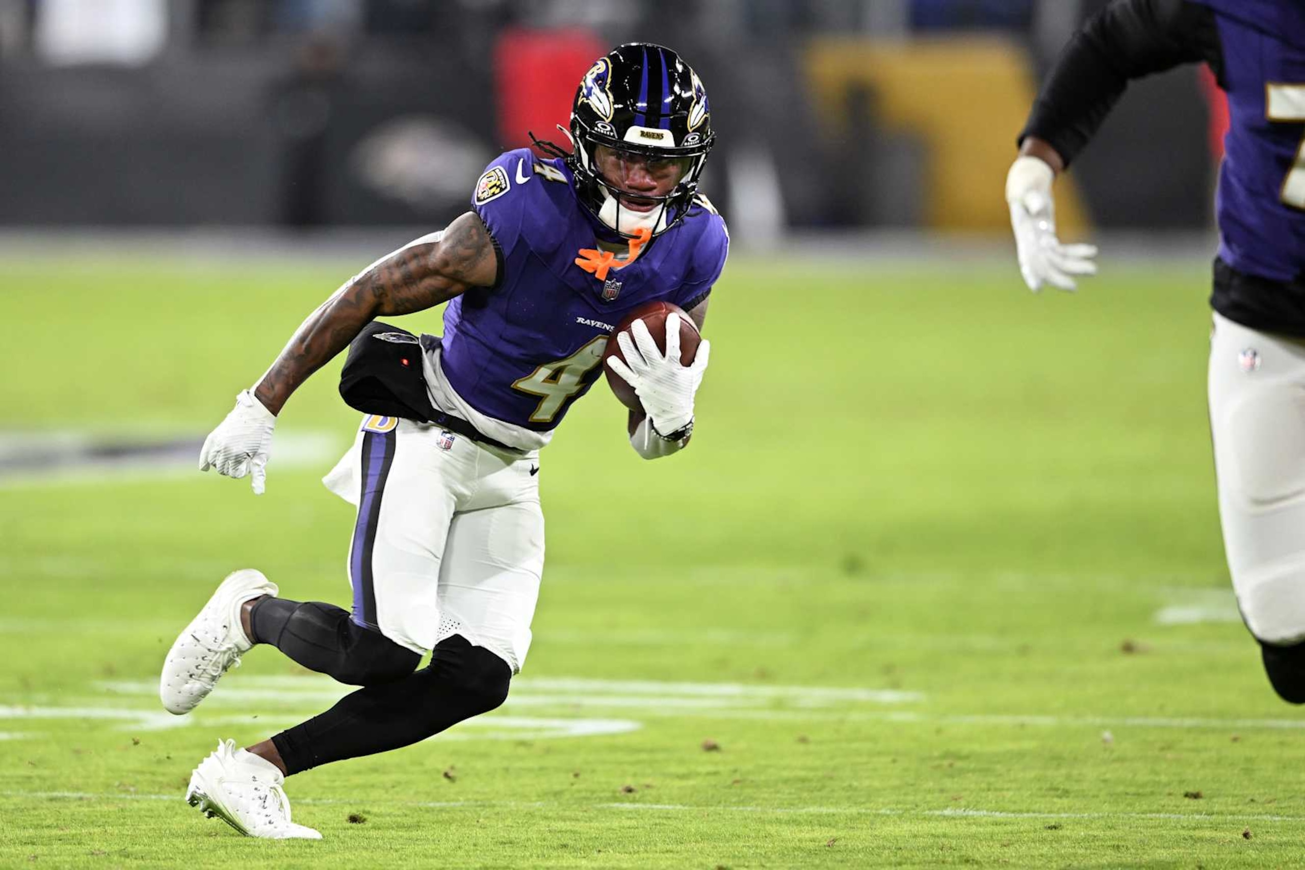 BALTIMORE, MARYLAND - JANUARY 04: Zay Flowers #4 of the Baltimore Ravens runs with the ball after a catch during the second quarter against the Cleveland Browns at M&T Bank Stadium on January 04, 2025 in Baltimore, Maryland. (Photo by Greg Fiume/Getty Images) BALTIMORE, MARYLAND - JANUARY 04: Zay Flowers #4 of the Baltimore Ravens runs with the ball after a catch during the second quarter against the Cleveland Browns at M&T Bank Stadium on January 04, 2025 in Baltimore, Maryland. (Photo by Greg Fiume/Getty Images)