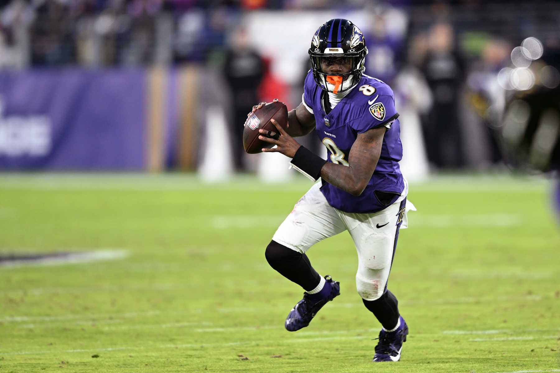 BALTIMORE, MARYLAND - JANUARY 04: Lamar Jackson #8 of the Baltimore Ravens runs with the ball during the first quarter against the Cleveland Browns at M&T Bank Stadium on January 04, 2025 in Baltimore, Maryland. (Photo by Greg Fiume/Getty Images)