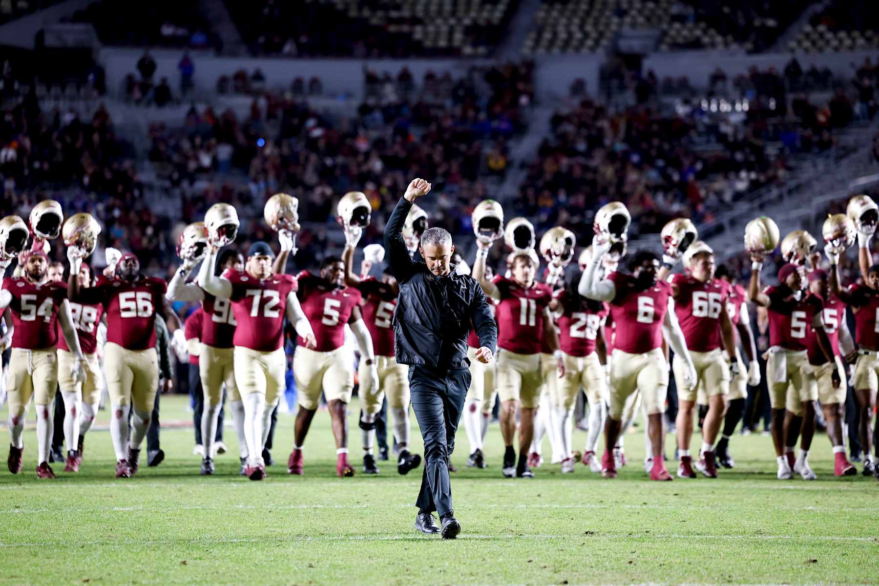 TALLAHASSEE, FL - NOVEMBER 30: Head Coach Mike Norvell of the Florida State Seminoles leads his team off the field after pregame warm-ups prior to the game against the Florida Gators at Doak Campbell Stadium on Bobby Bowden Field on November 30, 2024 in Tallahassee, Florida. (Photo by Don Juan Moore/Getty Images)