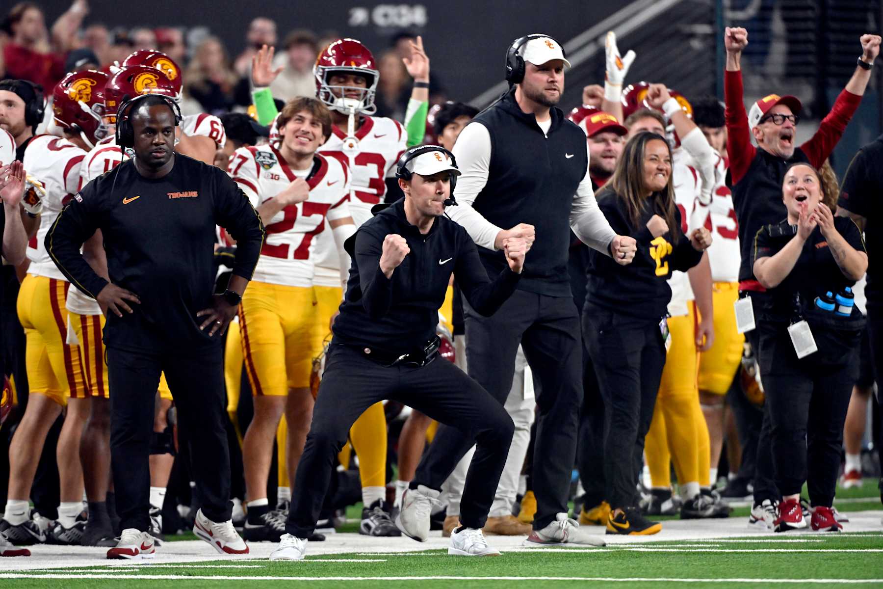 LAS VEGAS, NEVADA - DECEMBER 27: Head coach Lincoln Riley (C) of the USC Trojans reacts after the team scored during the second half against the Texas A&M Aggies in the SRS Distribution Las Vegas Bowl at Allegiant Stadium on December 27, 2024 in Las Vegas, Nevada. The Trojans defeated the Aggies 35-31. (Photo by David Becker/Getty Images)