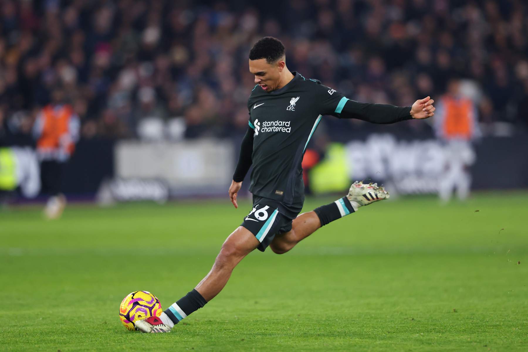 LONDON, ENGLAND - DECEMBER 29:  Trent Alexander-Arnold of Liverpool scores their fourth goal during the Premier League match between West Ham United FC and Liverpool FC at London Stadium on December 29, 2024 in London, England. (Photo by Marc Atkins/Getty Images)