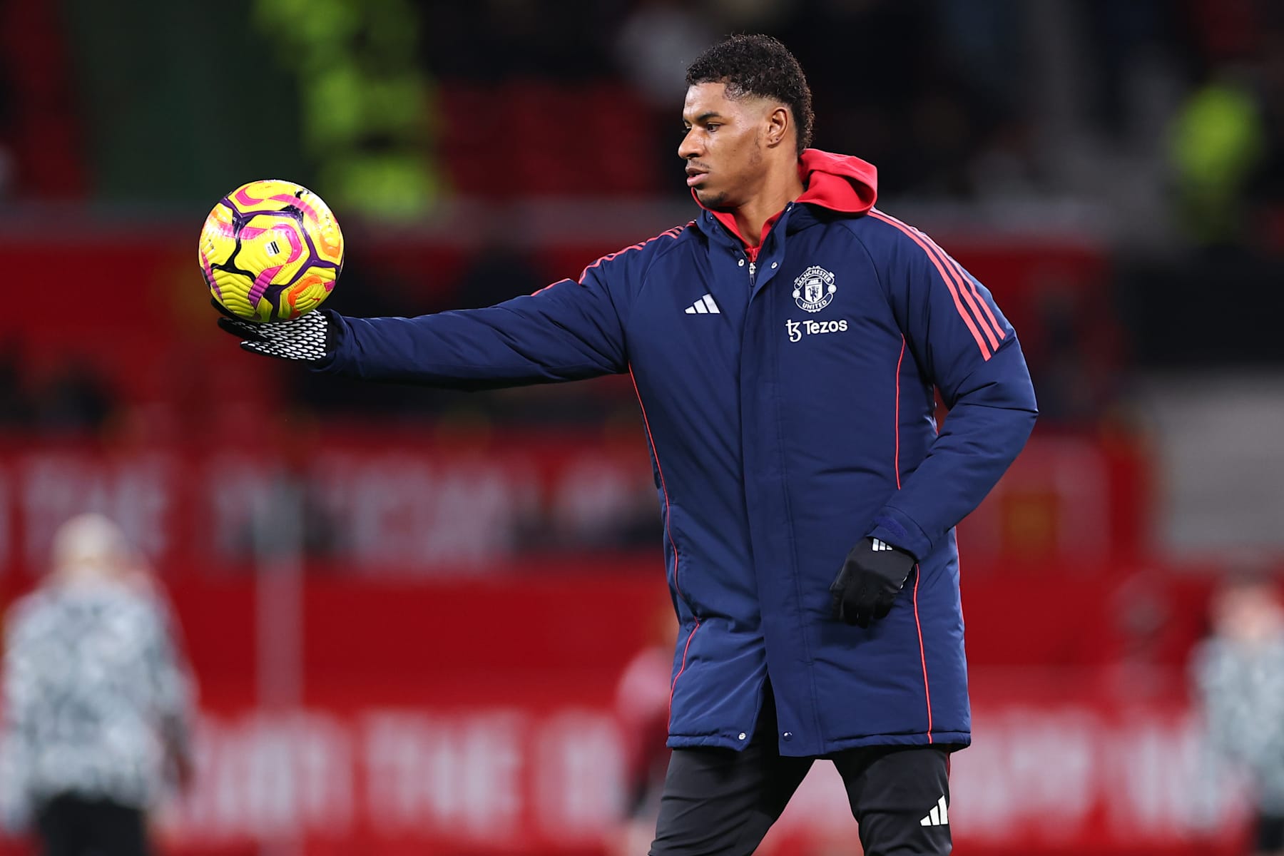 MANCHESTER, ENGLAND - DECEMBER 30: Marcus Rashford of Manchester United warms up ahead of the Premier League match between Manchester United FC and Newcastle United FC at Old Trafford on December 30, 2024 in Manchester, England. (Photo by Robbie Jay Barratt - AMA/Getty Images)