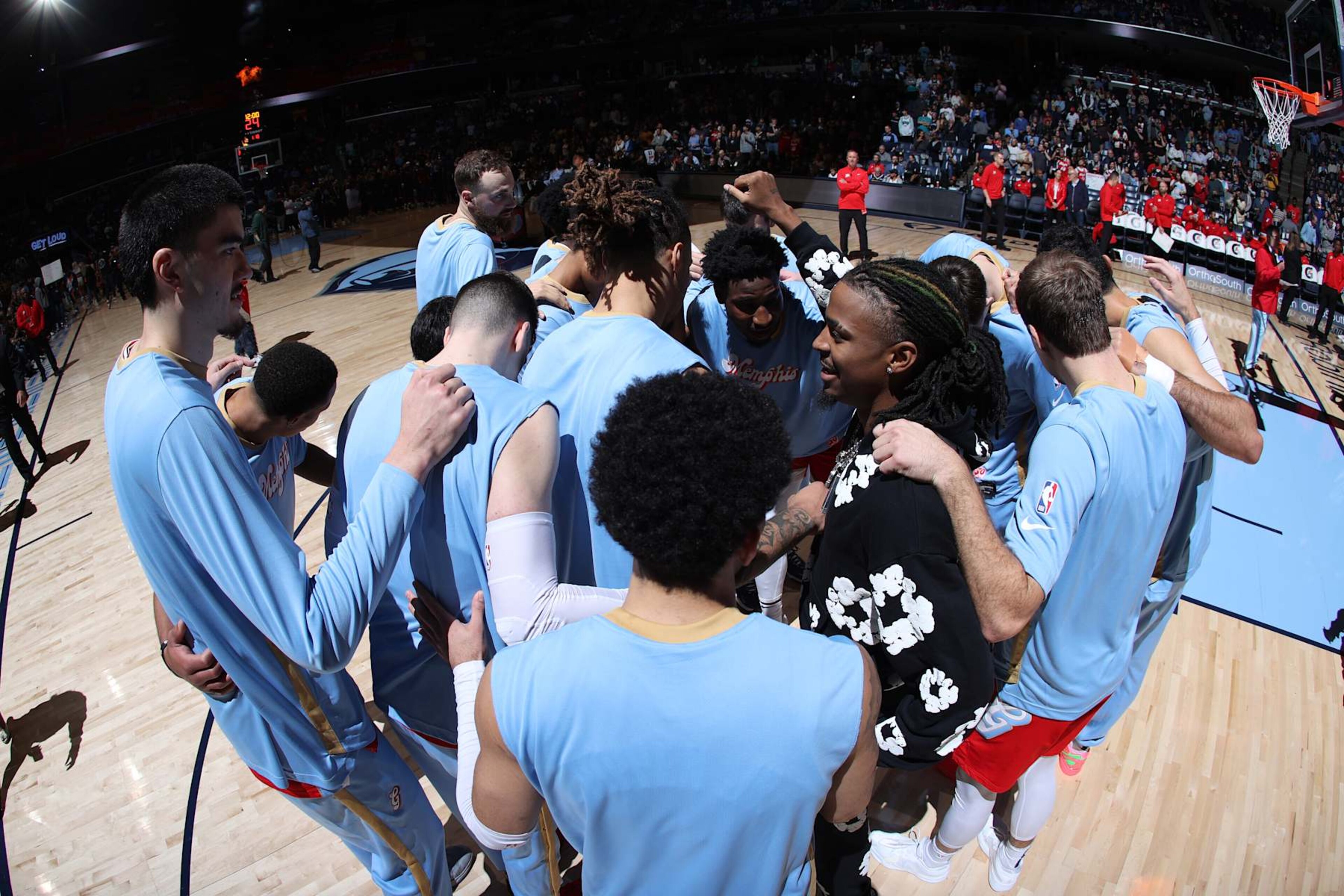 MEMPHIS, TN - NOVEMBER 17: Memphis Grizzlies huddle up before the game against the Denver Nuggets on November 17, 2024 at FedExForum in Memphis, Tennessee. NOTE TO USER: User expressly acknowledges and agrees that, by downloading and or using this photograph, User is consenting to the terms and conditions of the Getty Images License Agreement. Mandatory Copyright Notice: Copyright 2024 NBAE (Photo by Joe Murphy/NBAE via Getty Images) MEMPHIS, TN - NOVEMBER 17: Memphis Grizzlies huddle up before the game against the Denver Nuggets on November 17, 2024 at FedExForum in Memphis, Tennessee. NOTE TO USER: User expressly acknowledges and agrees that, by downloading and or using this photograph, User is consenting to the terms and conditions of the Getty Images License Agreement. Mandatory Copyright Notice: Copyright 2024 NBAE (Photo by Joe Murphy/NBAE via Getty Images)