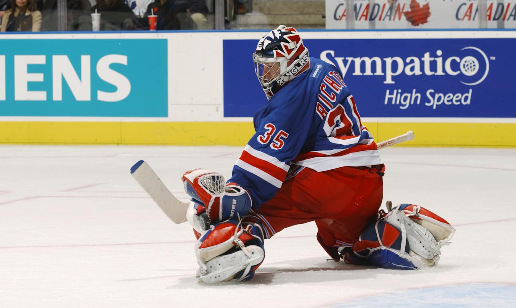 TORONTO - OCTOBER 26:  The puck gets past the glove of goaltender Mike Richter #35 of the New York Rangers on a shot by the Toronto Maple Leafs during the NHL game on October 26, 2002 at the Air Canada Centre,Toronto, Canada.  The Rangers won 4-3.  (Photo by Dave Sandford/Getty Images/NHLI)