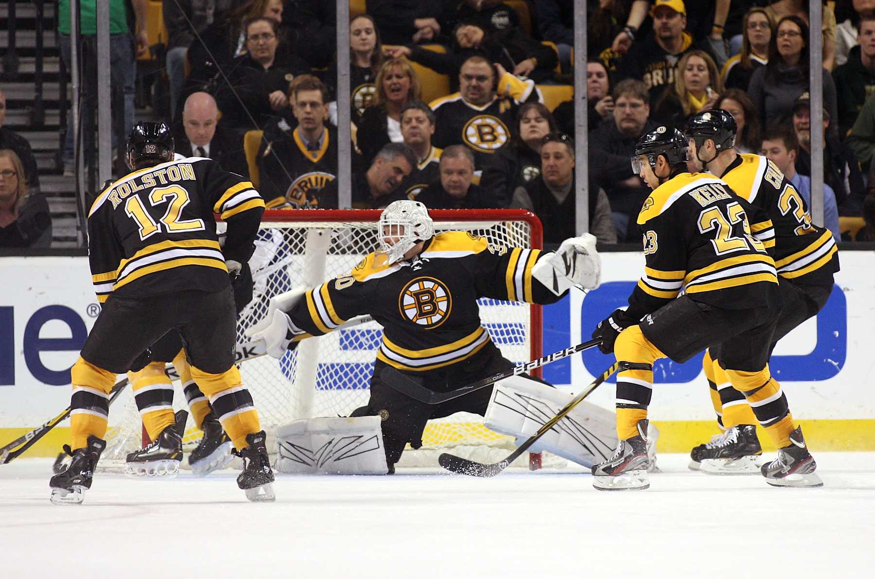 BOSTON, MA - MARCH 27: Tim Thomas #30 of the Boston Bruins makes a savea against the Tampa Bay Lightning at TD Garden on March 27, 2012 in Boston, Massachusetts.  (Photo by Alex Trautwig/Getty Images)