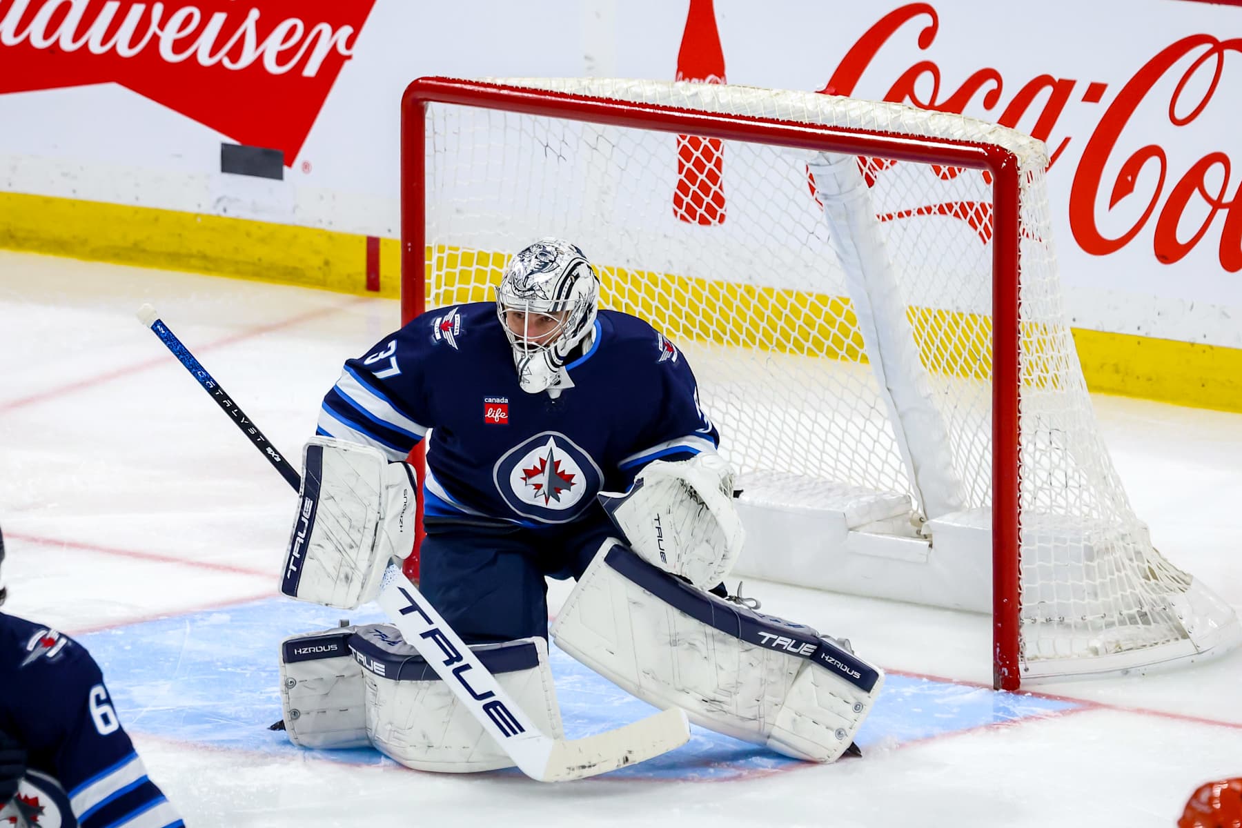 WINNIPEG, CANADA - JANUARY 2: Goaltender Connor Hellebuyck #37 of the Winnipeg Jets keeps an eye on the play during third period action against the Anaheim Ducks at the Canada Life Centre on January 2, 2025 in Winnipeg, Manitoba, Canada. (Photo by Jonathan Kozub/NHLI via Getty Images)