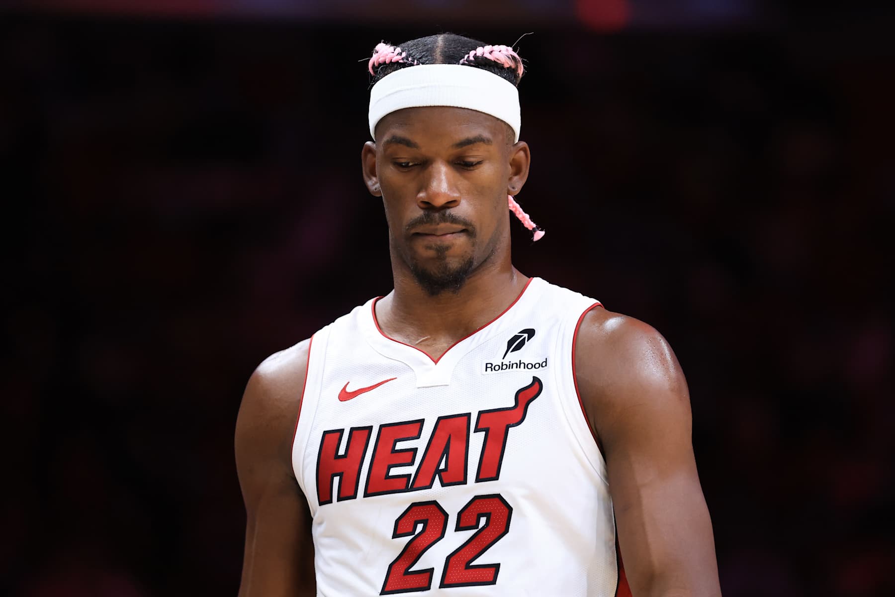 MIAMI, FLORIDA - JANUARY 01: Jimmy Butler #22 of the Miami Heat looks on against the New Orleans Pelicans during the second quarter of the game at Kaseya Center on January 01, 2025 in Miami, Florida. NOTE TO USER: User expressly acknowledges and agrees that, by downloading and or using this photograph, User is consenting to the terms and conditions of the Getty Images License Agreement. (Photo by Megan Briggs/Getty Images)
