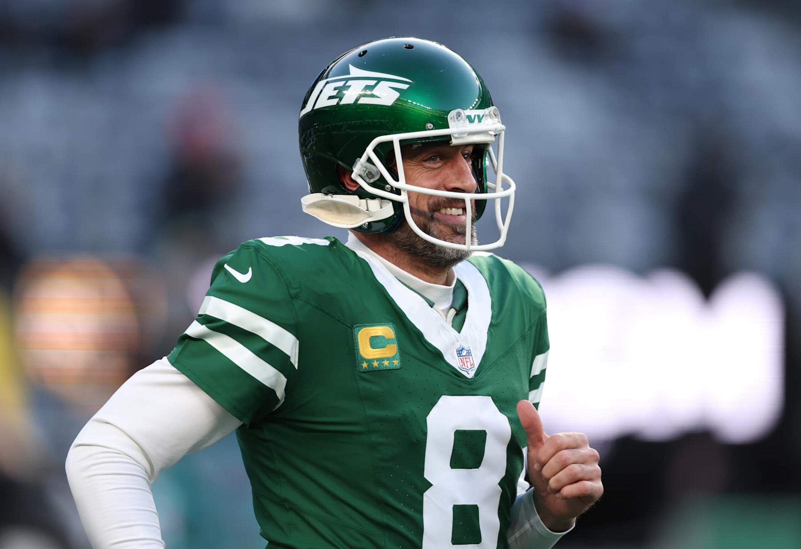EAST RUTHERFORD, NEW JERSEY - JANUARY 05: Aaron Rodgers #8 of the New York Jets reacts before the game against the Miami Dolphins at MetLife Stadium on January 05, 2025 in East Rutherford, New Jersey. (Photo by Luke Hales/Getty Images)