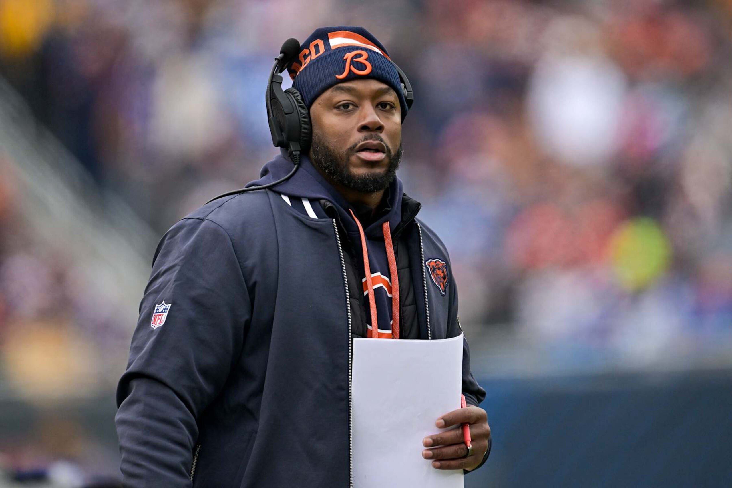 CHICAGO, ILLINOIS - DECEMBER 22: Head coach Thomas Brown of the Chicago Bears looks on during the second quarter against the Detroit Lions at Soldier Field on December 22, 2024 in Chicago, Illinois. (Photo by Quinn Harris/Getty Images)