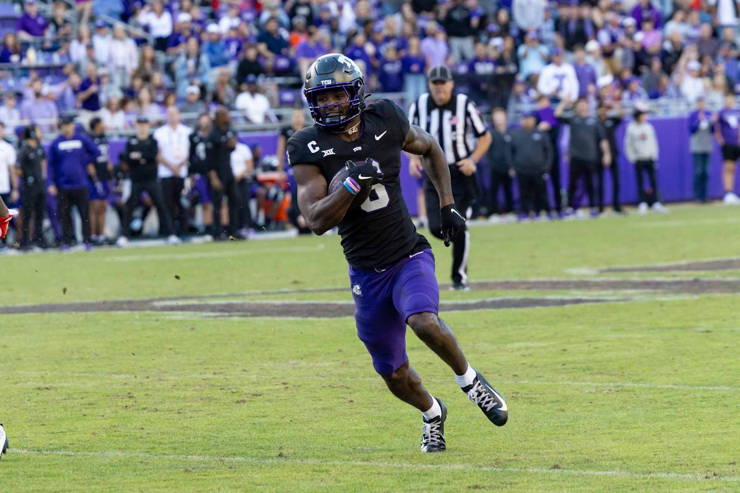 FORT WORTH, TX - NOVEMBER 23: TCU Horned Frogs wide receiver Savion Williams (#3) runs up field during the Big 12 college football game between the Arizona Wildcats and TCU Horned Frogs on November 23, 2024 at Amon G. Carter Stadium in Fort Worth, TX.  (Photo by Matthew Visinsky/Icon Sportswire via Getty Images)