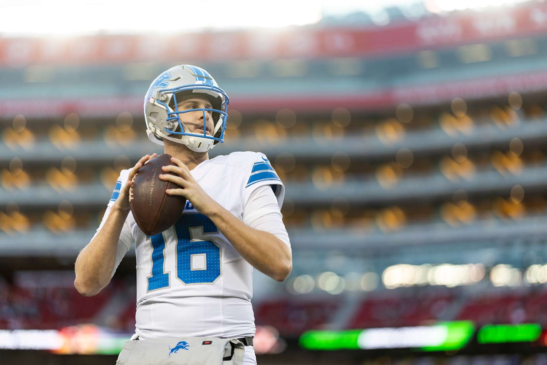 SANTA CLARA, CALIFORNIA - DECEMBER 30: Jared Goff #16 of the Detroit Lions looks to pass during an NFL Football game against the San Francisco 49ers at Levi's Stadium on December 30, 2024 in Santa Clara, California. (Photo by Michael Owens/Getty Images)