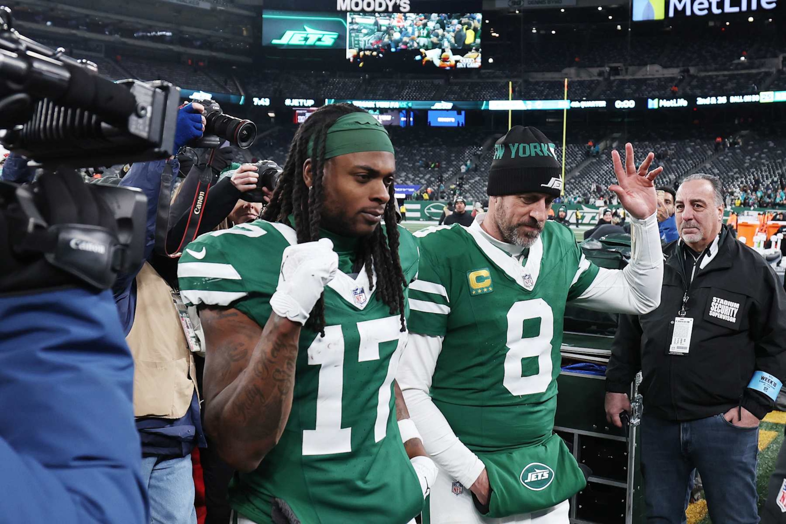 EAST RUTHERFORD, NEW JERSEY - JANUARY 05: Aaron Rodgers #8 and Davante Adams #17 of the New York Jets leave the field after beating the Miami Dolphins 32-20 at MetLife Stadium on January 05, 2025 in East Rutherford, New Jersey. (Photo by Luke Hales/Getty Images) EAST RUTHERFORD, NEW JERSEY - JANUARY 05: Aaron Rodgers #8 and Davante Adams #17 of the New York Jets leave the field after beating the Miami Dolphins 32-20 at MetLife Stadium on January 05, 2025 in East Rutherford, New Jersey. (Photo by Luke Hales/Getty Images)