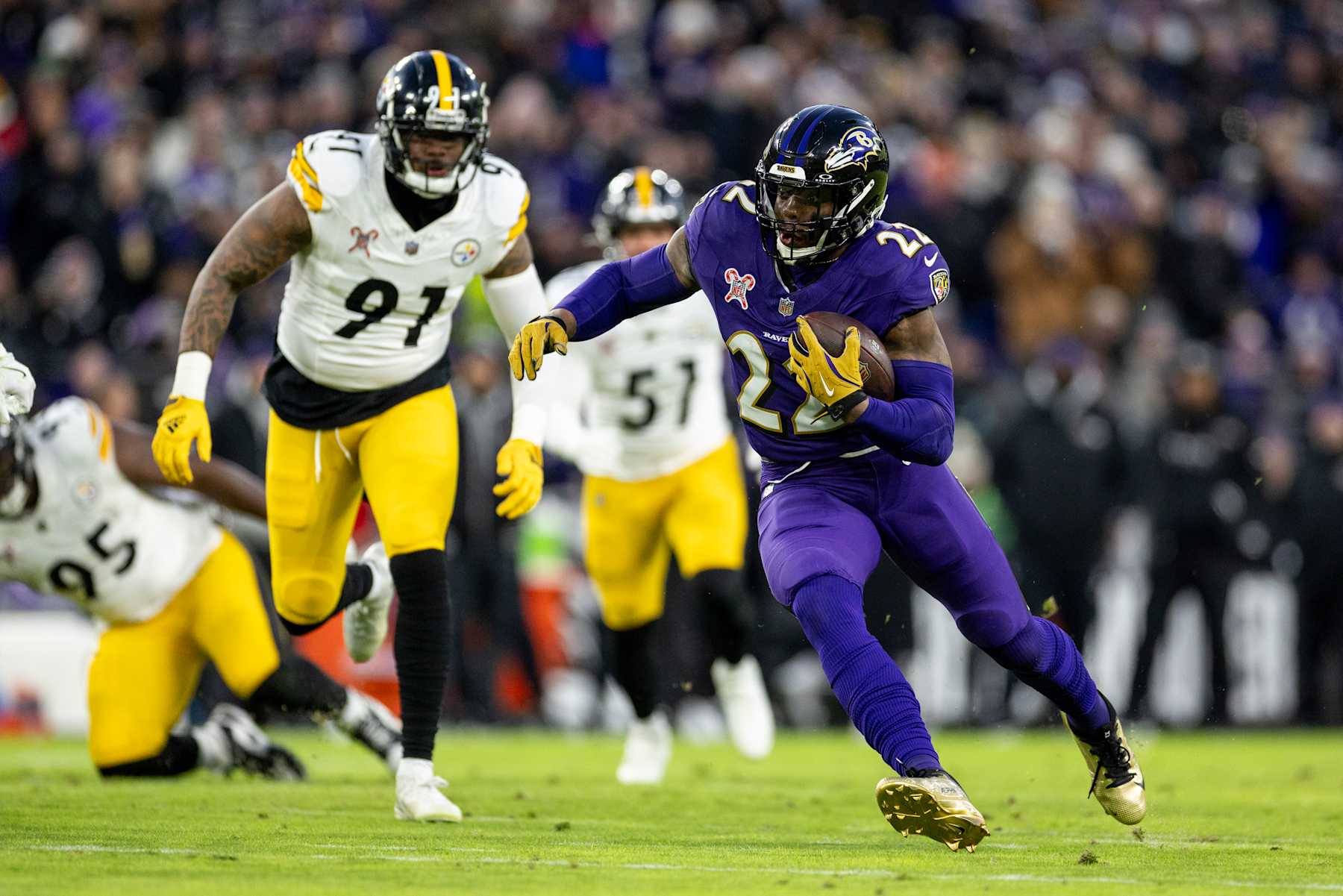 BALTIMORE, MARYLAND - DECEMBER 21: Derrick Henry #22 of the Baltimore Ravens runs with the ball during an NFL Football game against the Pittsburgh Steelers at M&T Bank Stadium on December 21, 2024 in Baltimore, Maryland. (Photo by Michael Owens/Getty Images) BALTIMORE, MARYLAND - DECEMBER 21: Derrick Henry #22 of the Baltimore Ravens runs with the ball during an NFL Football game against the Pittsburgh Steelers at M&T Bank Stadium on December 21, 2024 in Baltimore, Maryland. (Photo by Michael Owens/Getty Images)